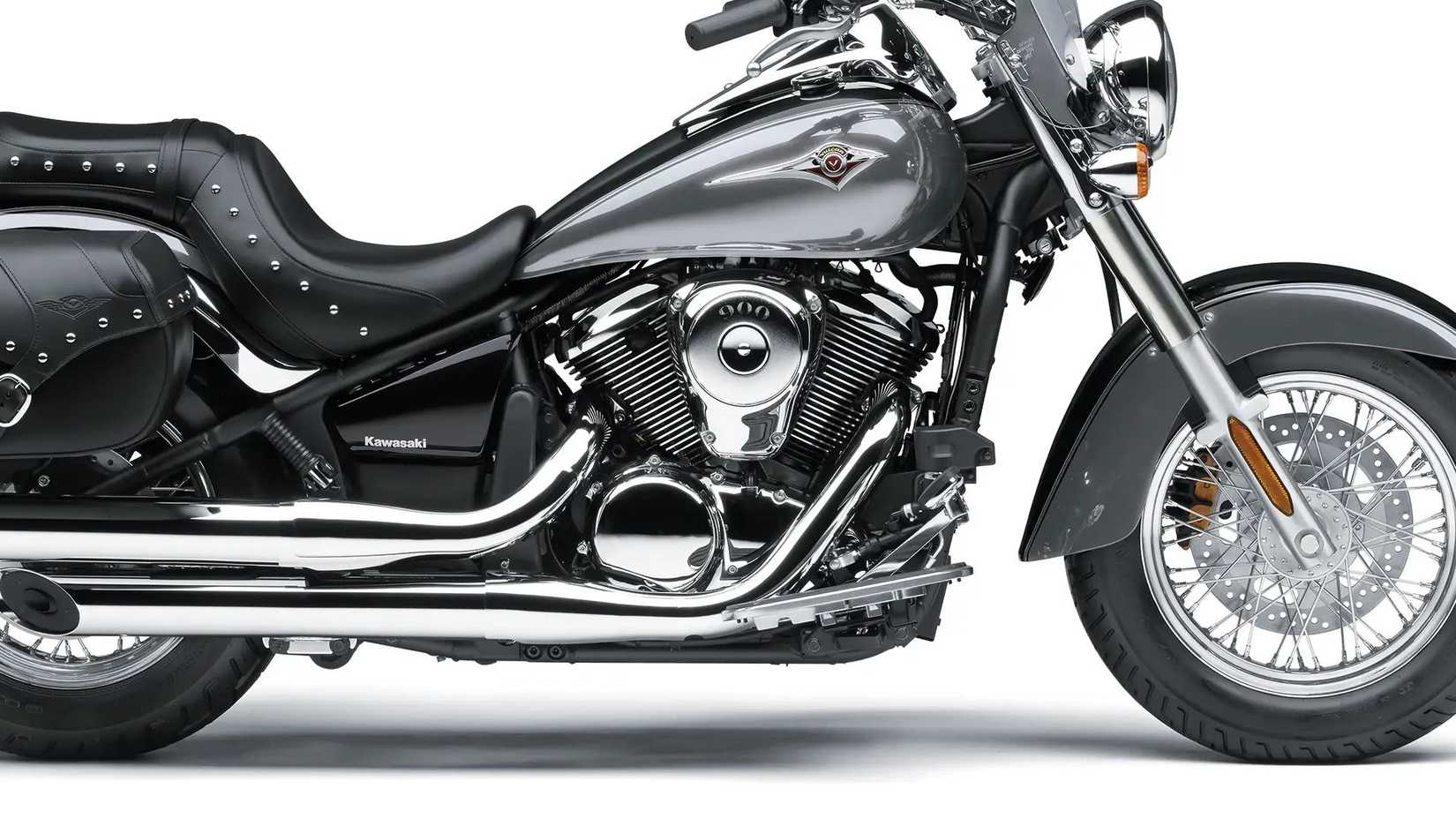 Close-up shot of the Kawasaki Vulcan 900 Classic LT's engine in a studio
