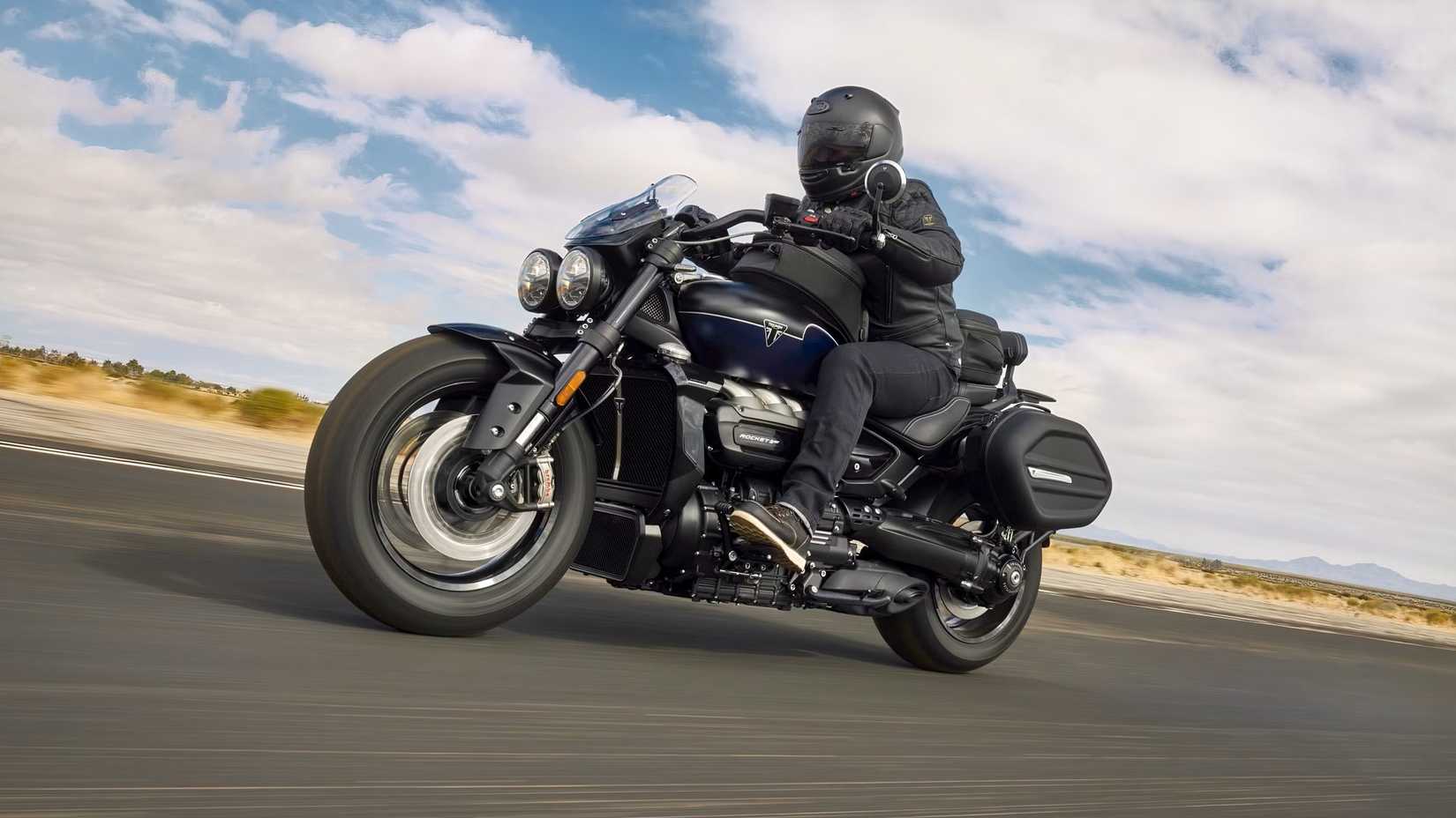 Triumph Rocket 3 Storm GT side shot accelerating on the road