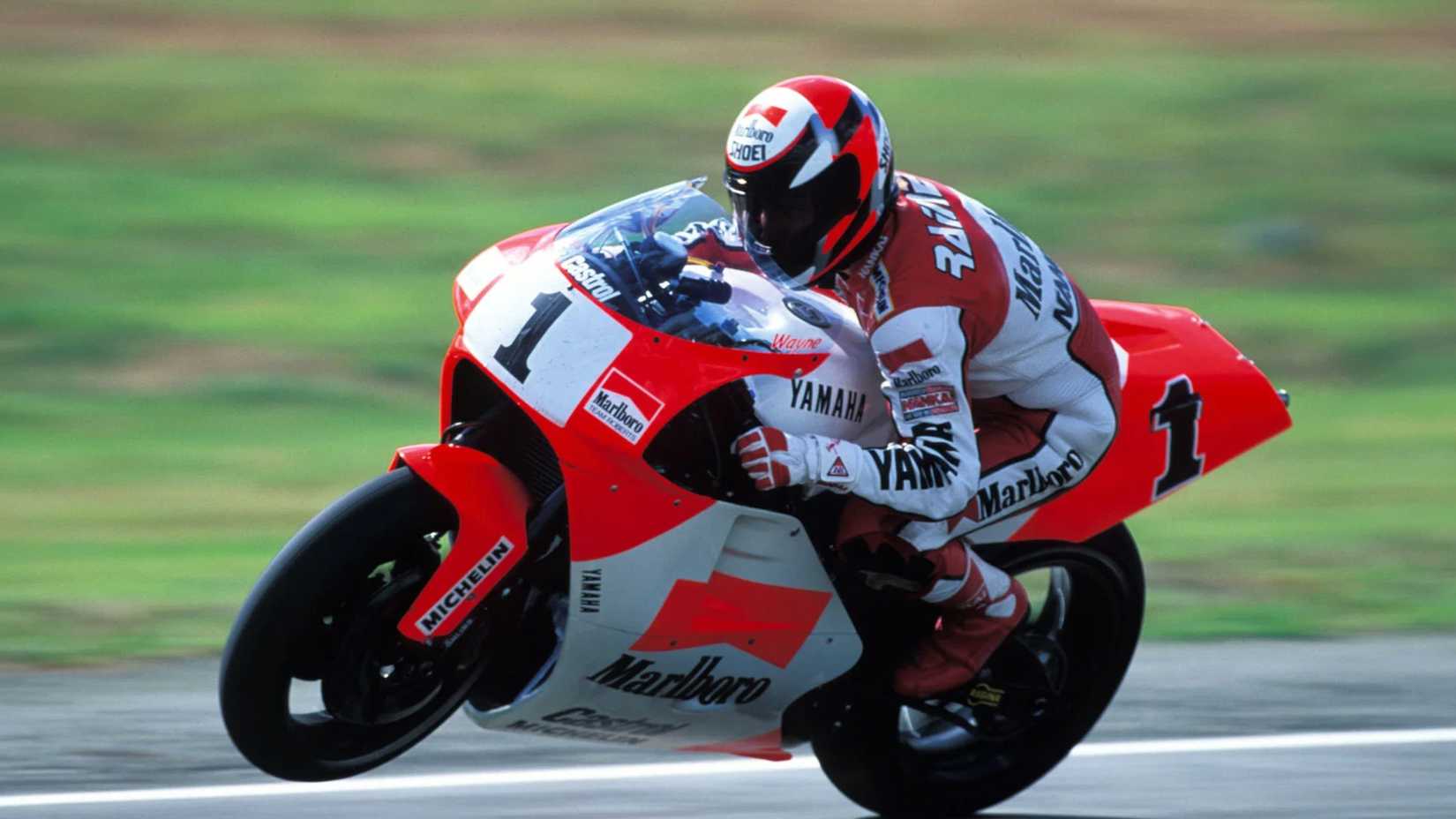 Wayne Rainey driving a wheelie at the race track