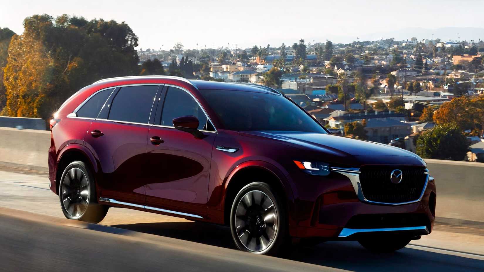 2026 Mazda CX-90 Driving Passenger Side Front 3/4