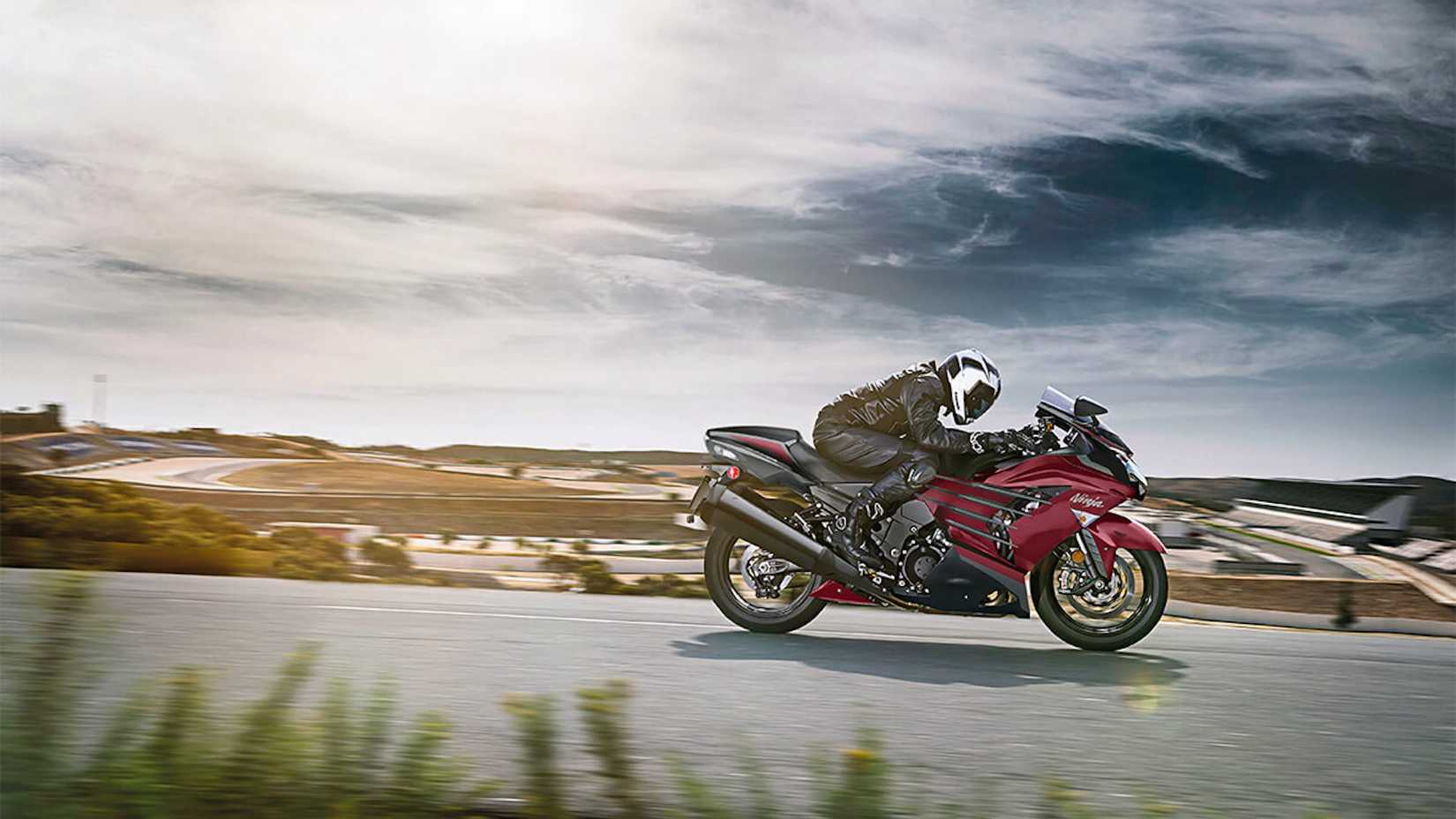 Action shot of a maroon Kawasaki Ninja ZX-14R 