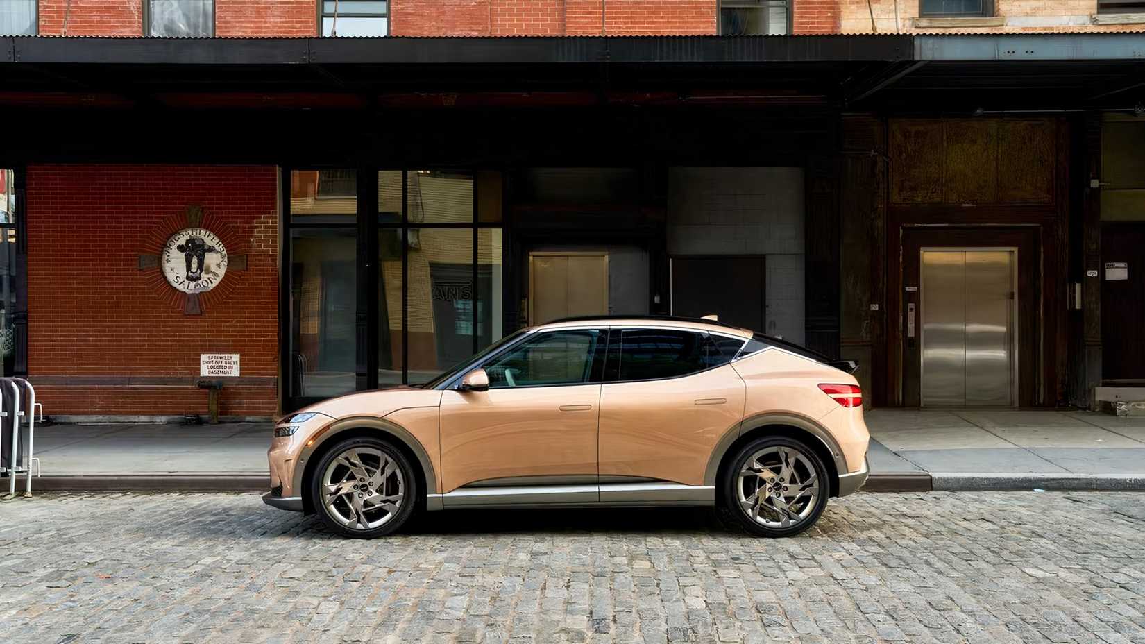 Profile shot of 2026 Genesis GV60 parked