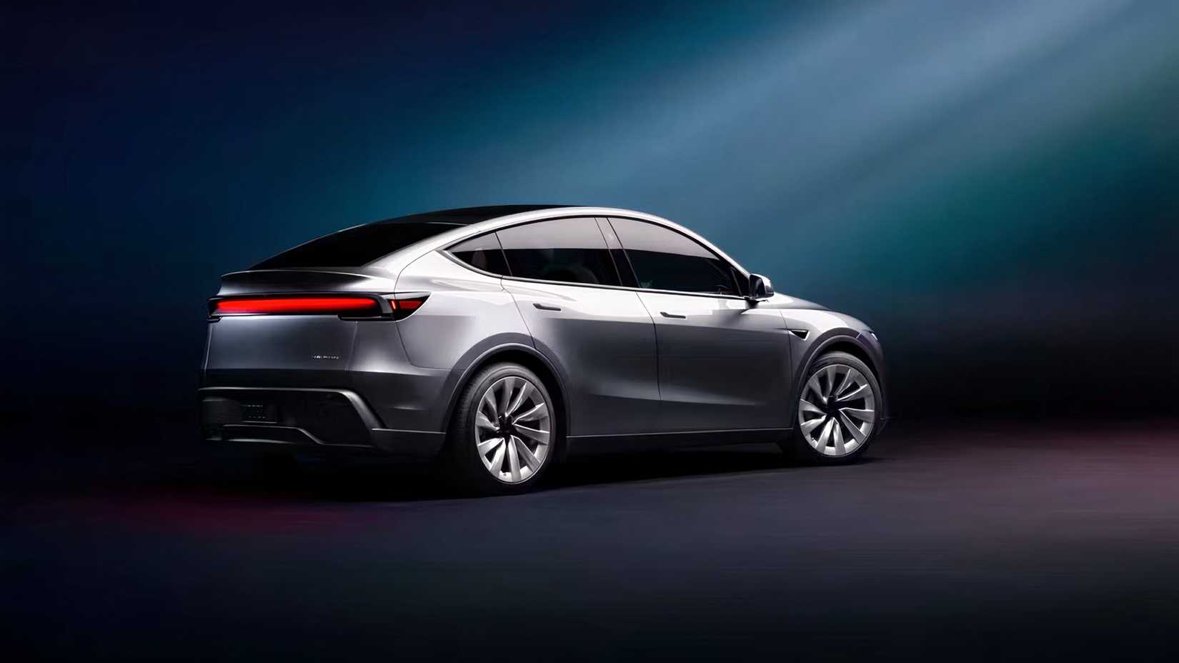 Rear 3/4 studio shot of 2026 Tesla Model Y parked