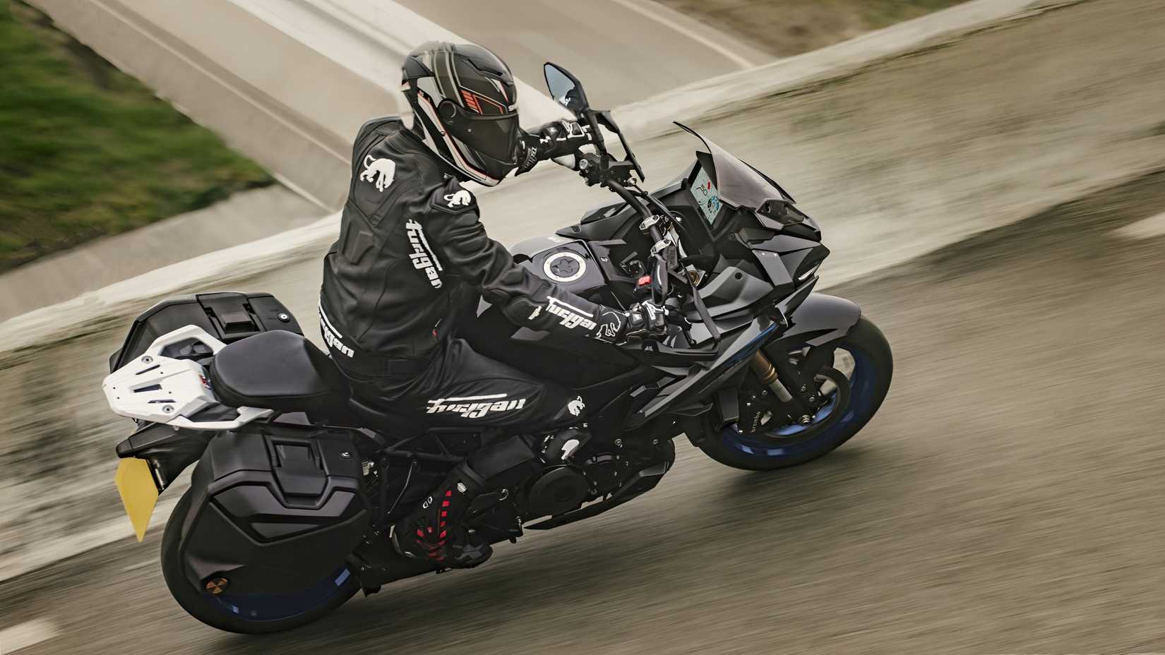 2026 Suzuki GSX-S1000GX+ leaning into a corner
