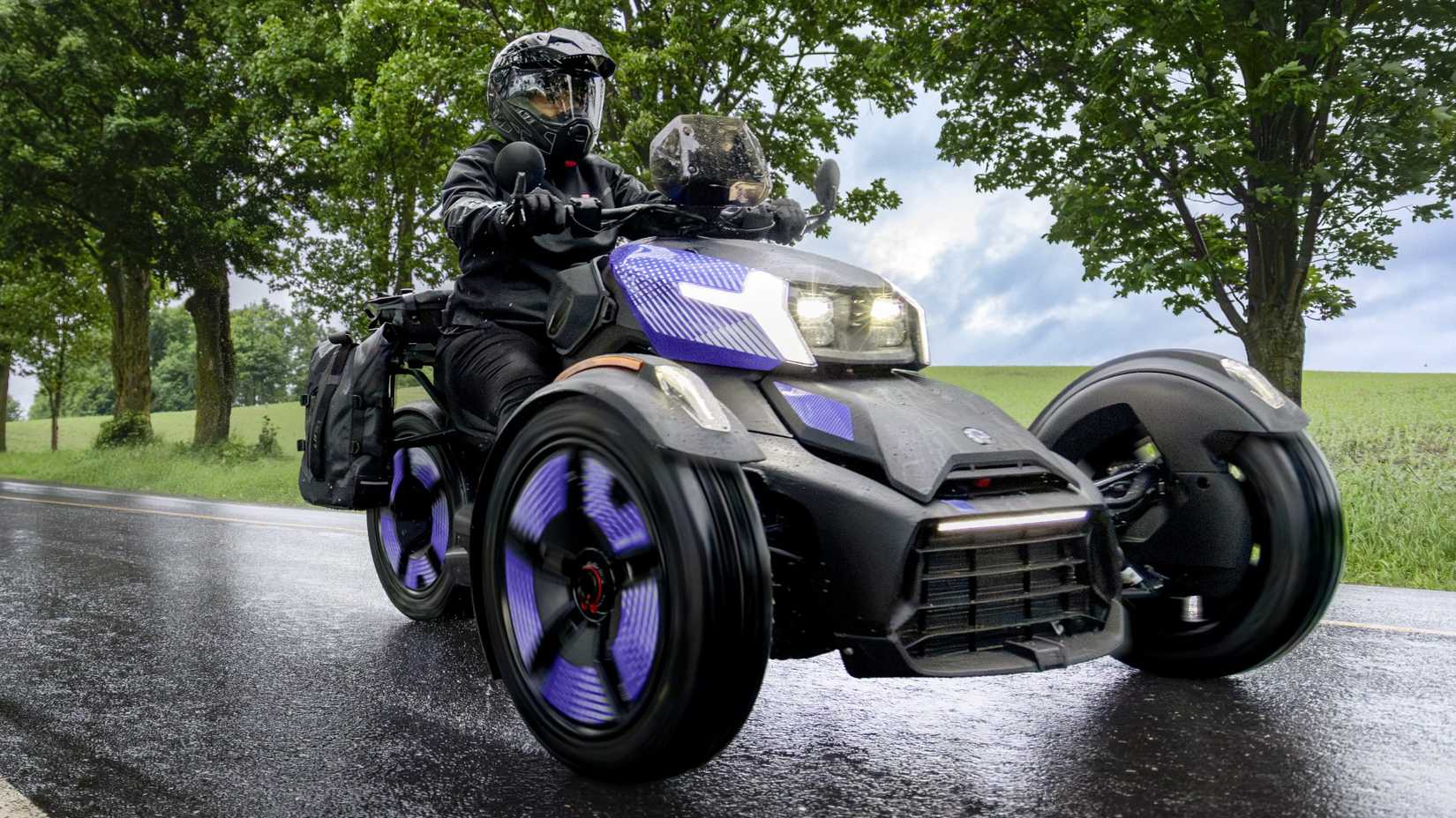 Can-Am Ryker Sport cruising on a raining day front third quarter view