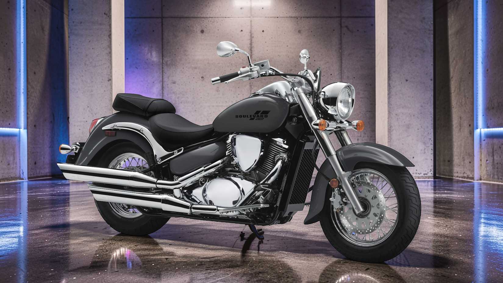 Gray 2025 Suzuki Boulevard C50 parked in a garage, static front quarter shot