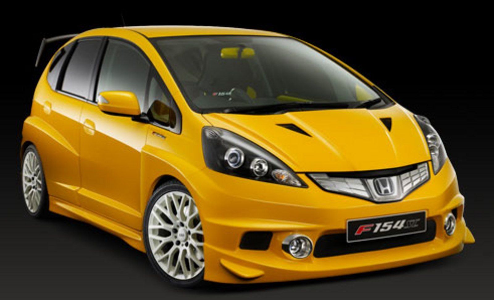 Honda fit бензин. Хонда фит муген. Хонда фит мюген. Хонда фит 2012. Хонда фит оранжевая.