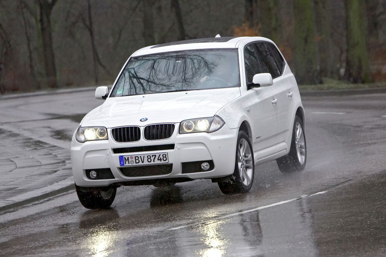 BMW X3 on a backroad 