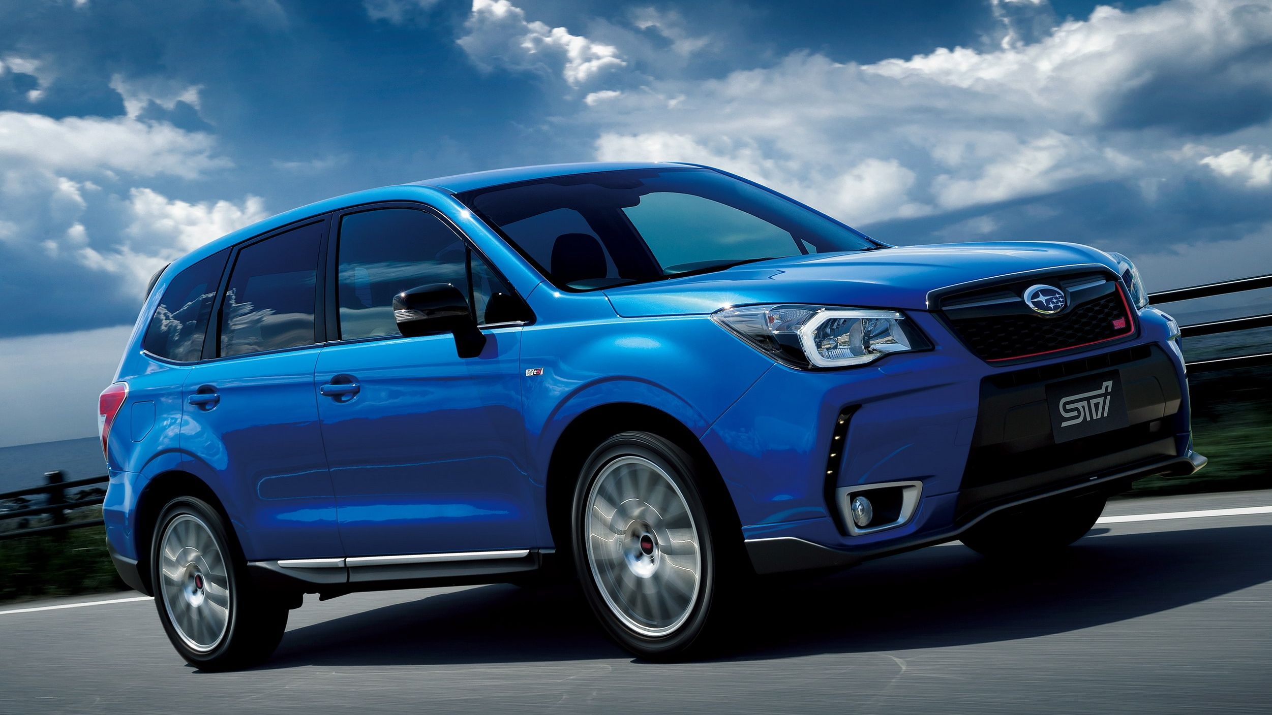 Well, it's not a true STI, but the Forester tS is a pretty cool in-between model. 