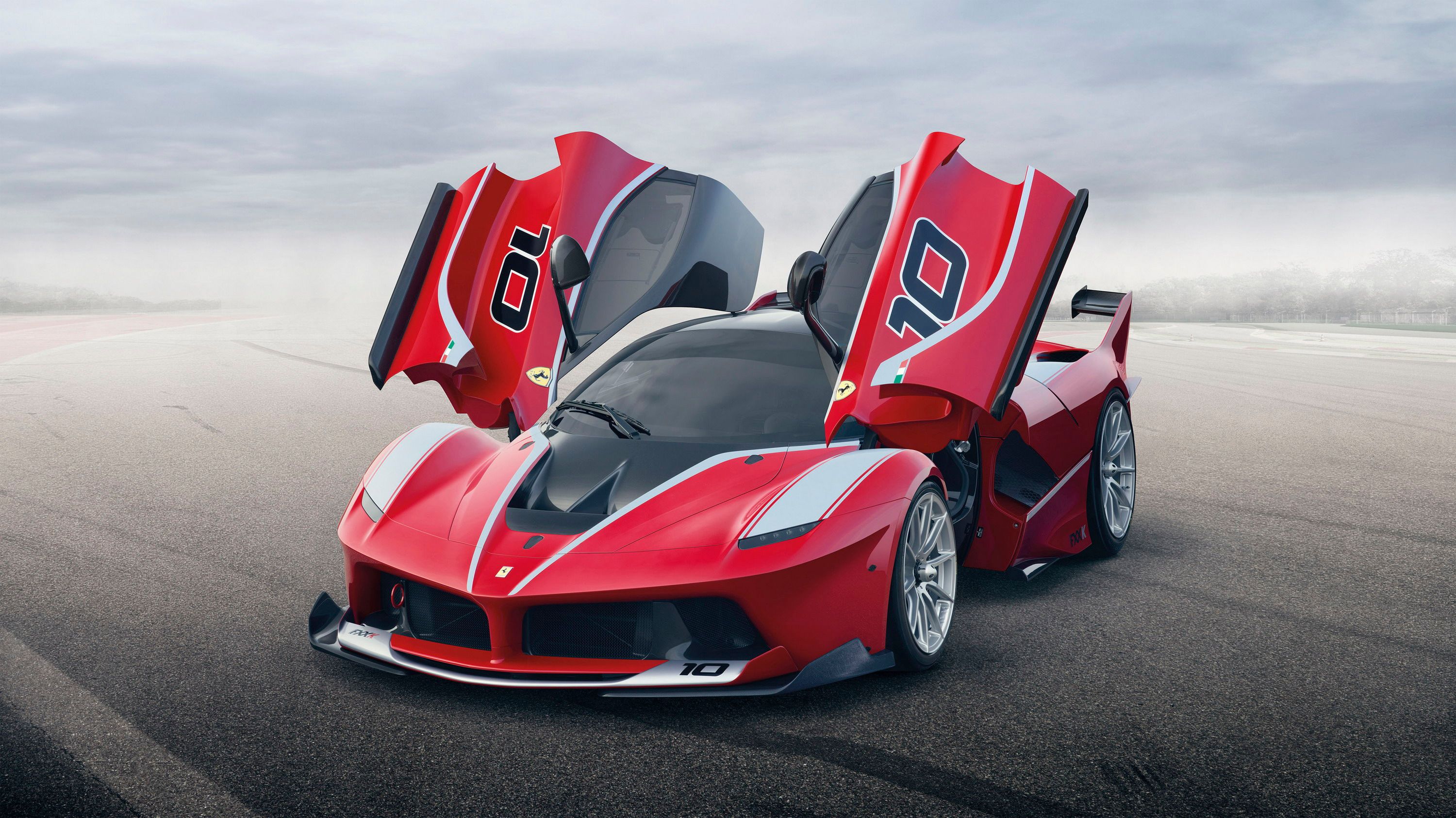  The Ferrari FXX K (AKA the track-only LaFerrari) has finally made its debut. Check out all of its hybrid supercar awesomeness at TopSpeed.com!
