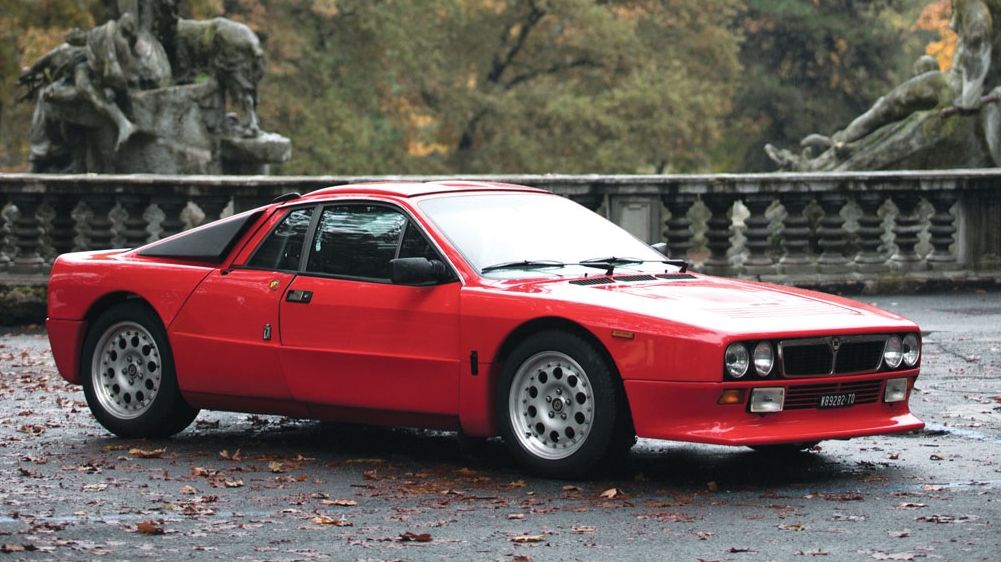  The super-rare Lancia 037 Stradale is a look back at the old days of rally racing, when mid-engine, RWD cars could actually compete in the sport, and now one of its road-going brethren is up for auction. Check it out at TopSpeed.com.