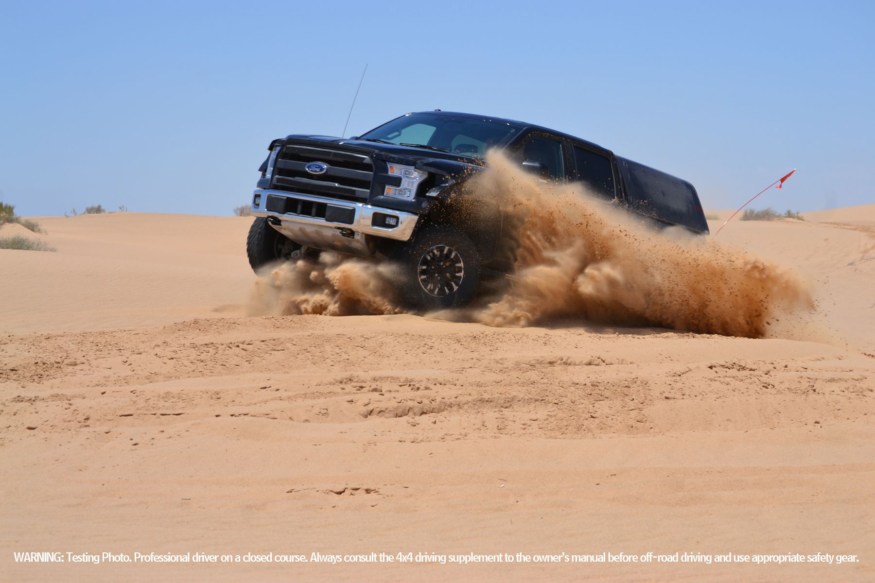 2015 Ford Releases Drone Footage of 2017 Raptor Blasting Over Sand Dunes