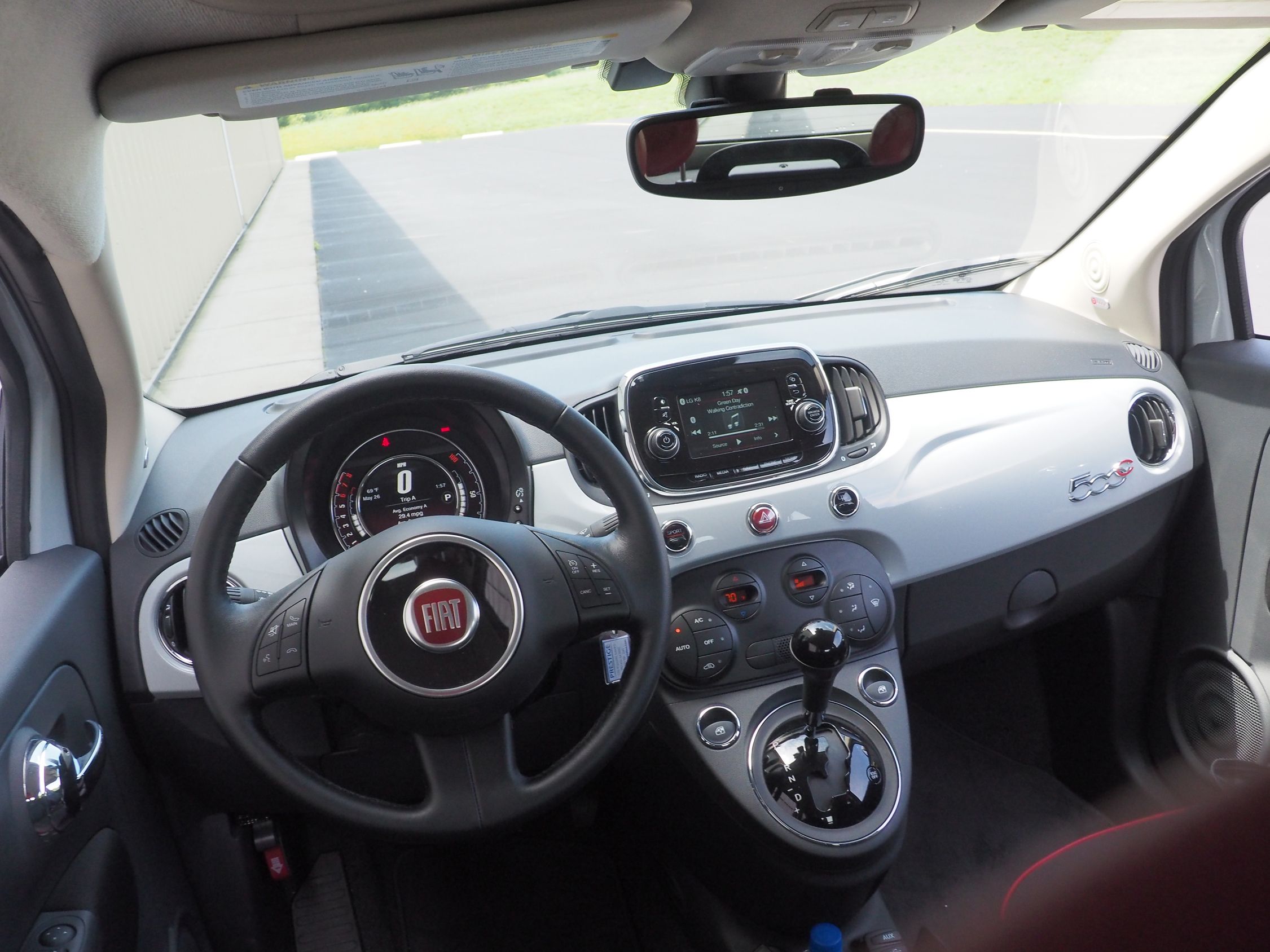 This Fiat 500C features a nice interior