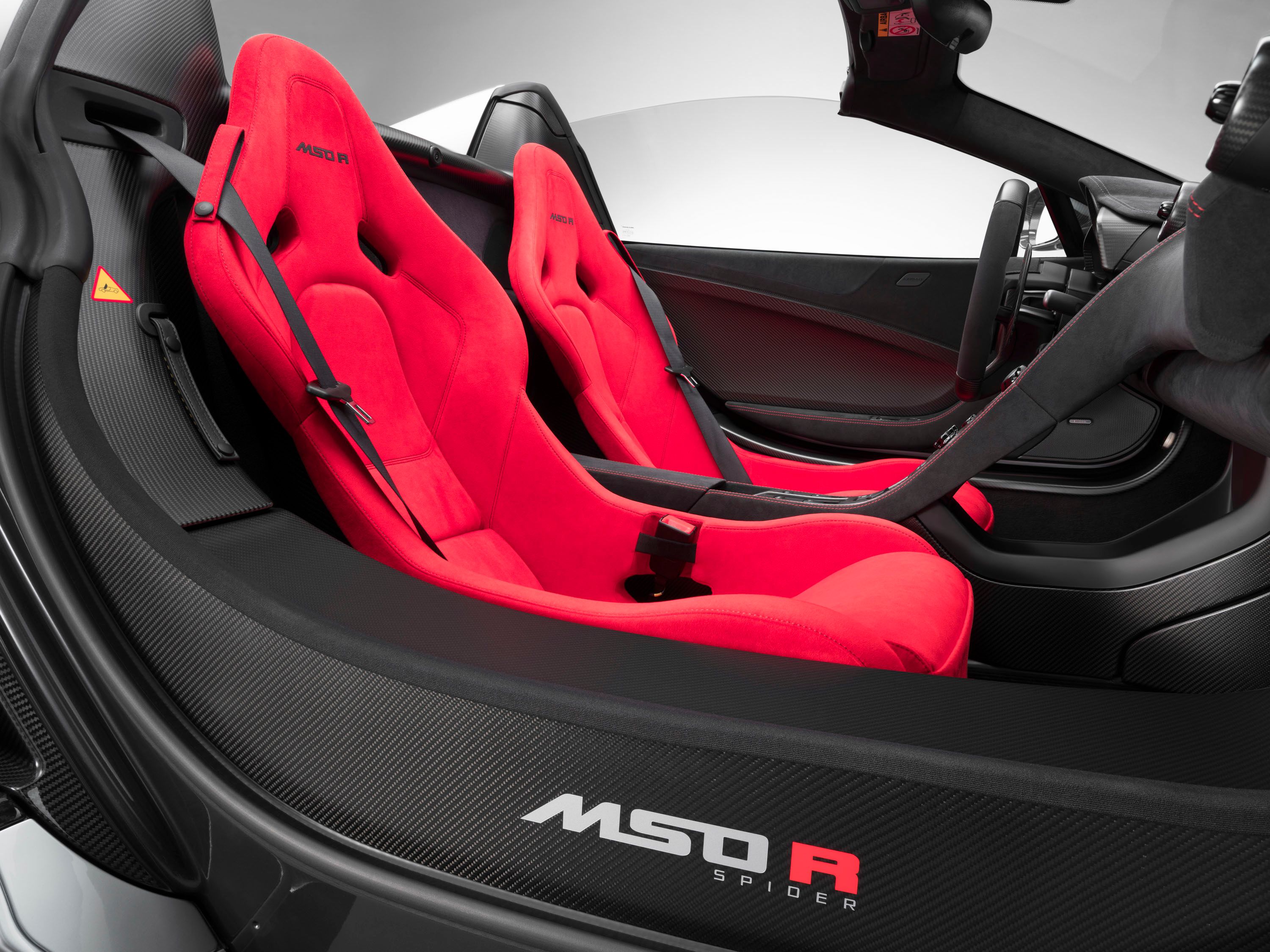 While the seats get red Alcantara with black stitching