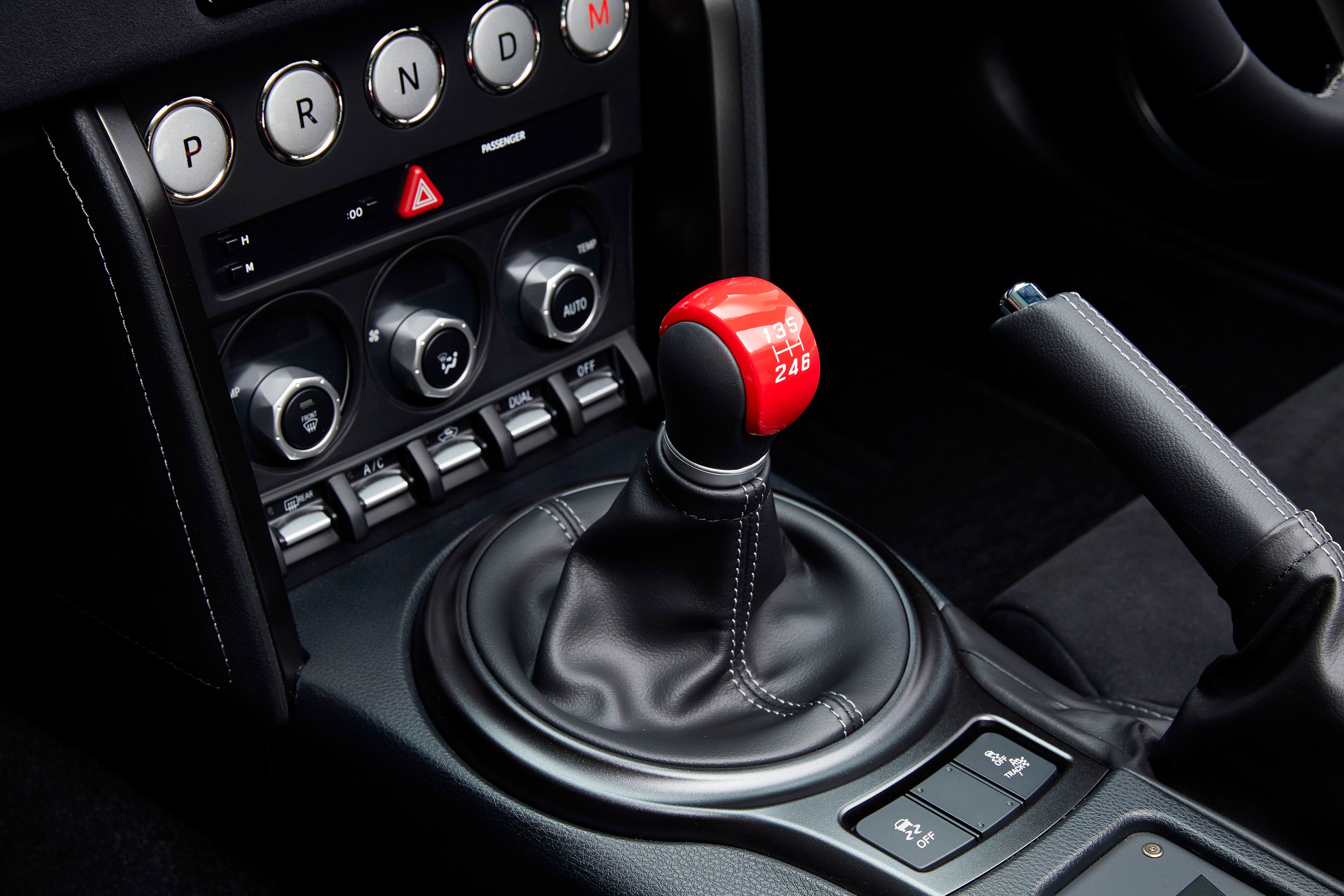 Buttons operate gearbox modes