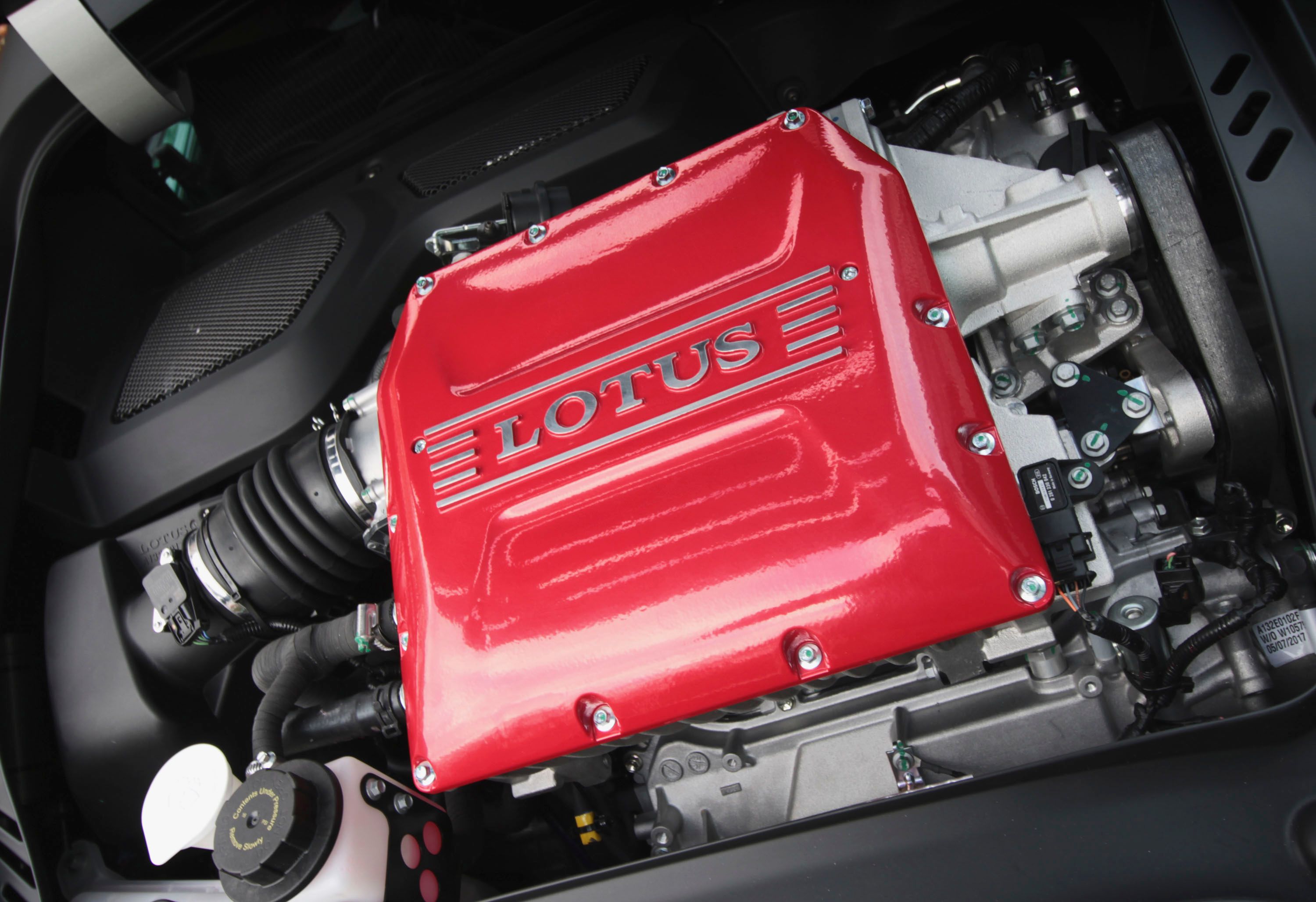 Mid-mounted supercharged 3.5-liter V-6; 430 HP, 325 LB-FT