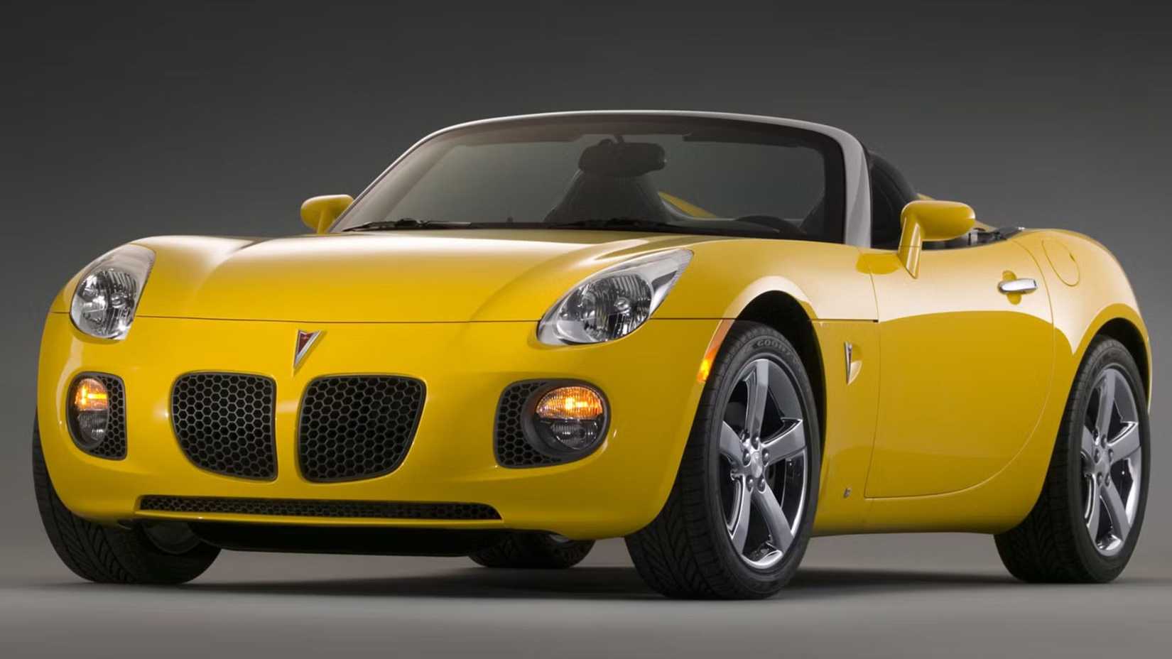 2006-2009 Pontiac Solstice Convertible Yellow Roof Down Front Angled View