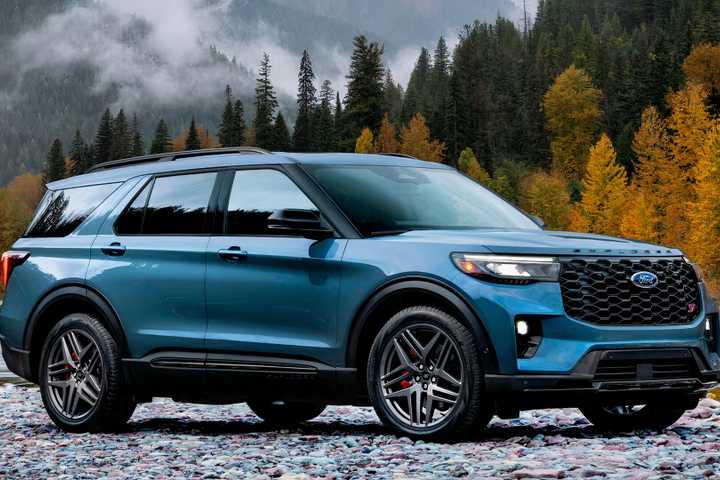 2025 Ford Explorer in blue parked off-road