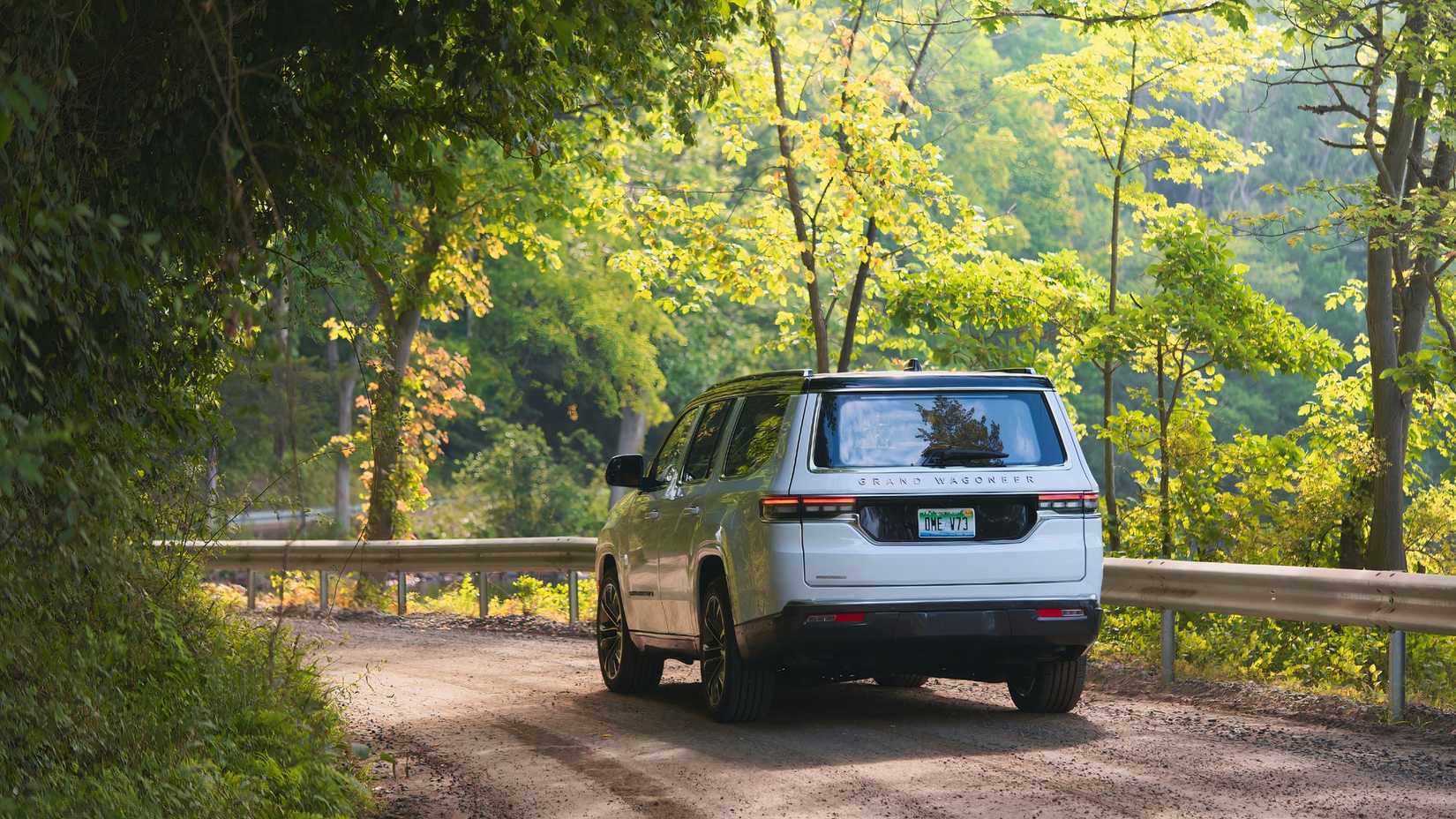 2025-jeep-grand-wagoneer-driving-on-a-dirt-road.jpg