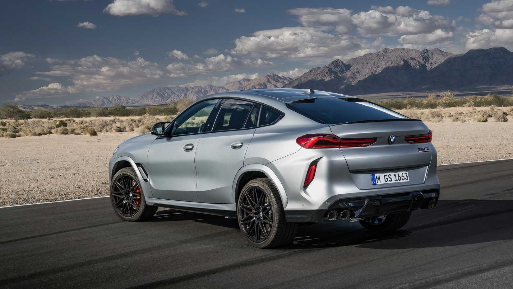 2026-bmw-x6-m-parked-outdoors-rear-three-quarter.jpg