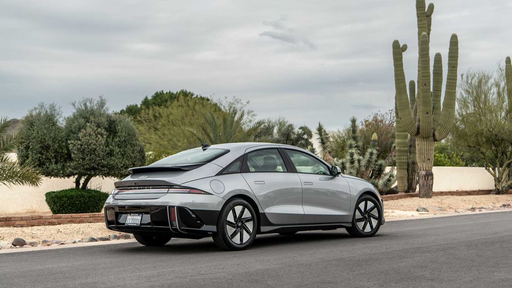 Rear 3/4 shot of a 2024 Hyundai Ioniq 6 SE Standard Range parked on the road