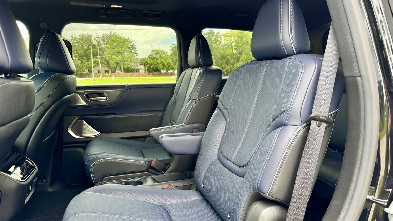Interior shot of a 2026 Infiniti QX80 showing rear seats
