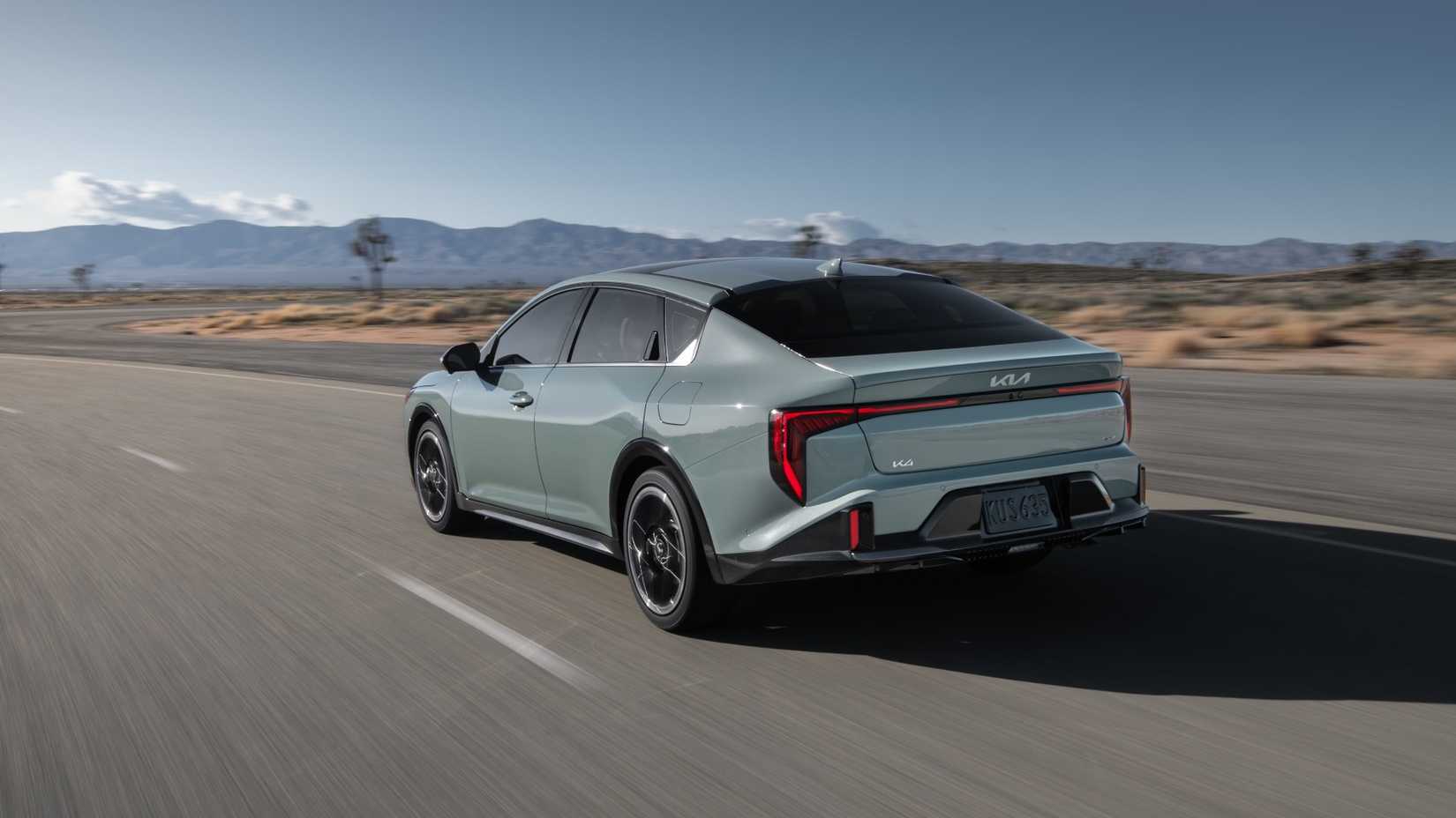 cropped-2025-kia-k4-rear-driving.jpg