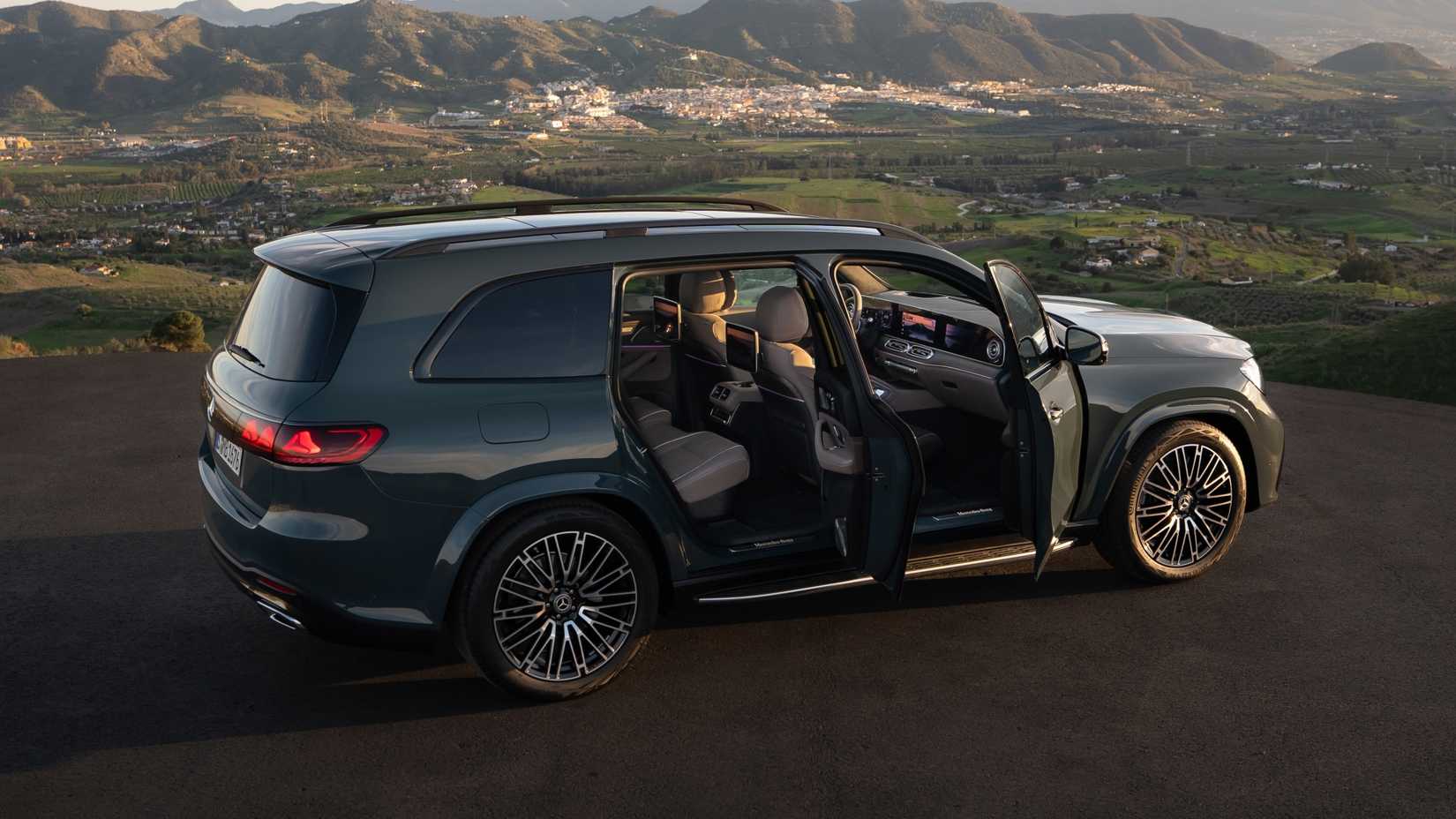 Side shot of a 2027 Mercedes-Benz GLS 580 with doors open