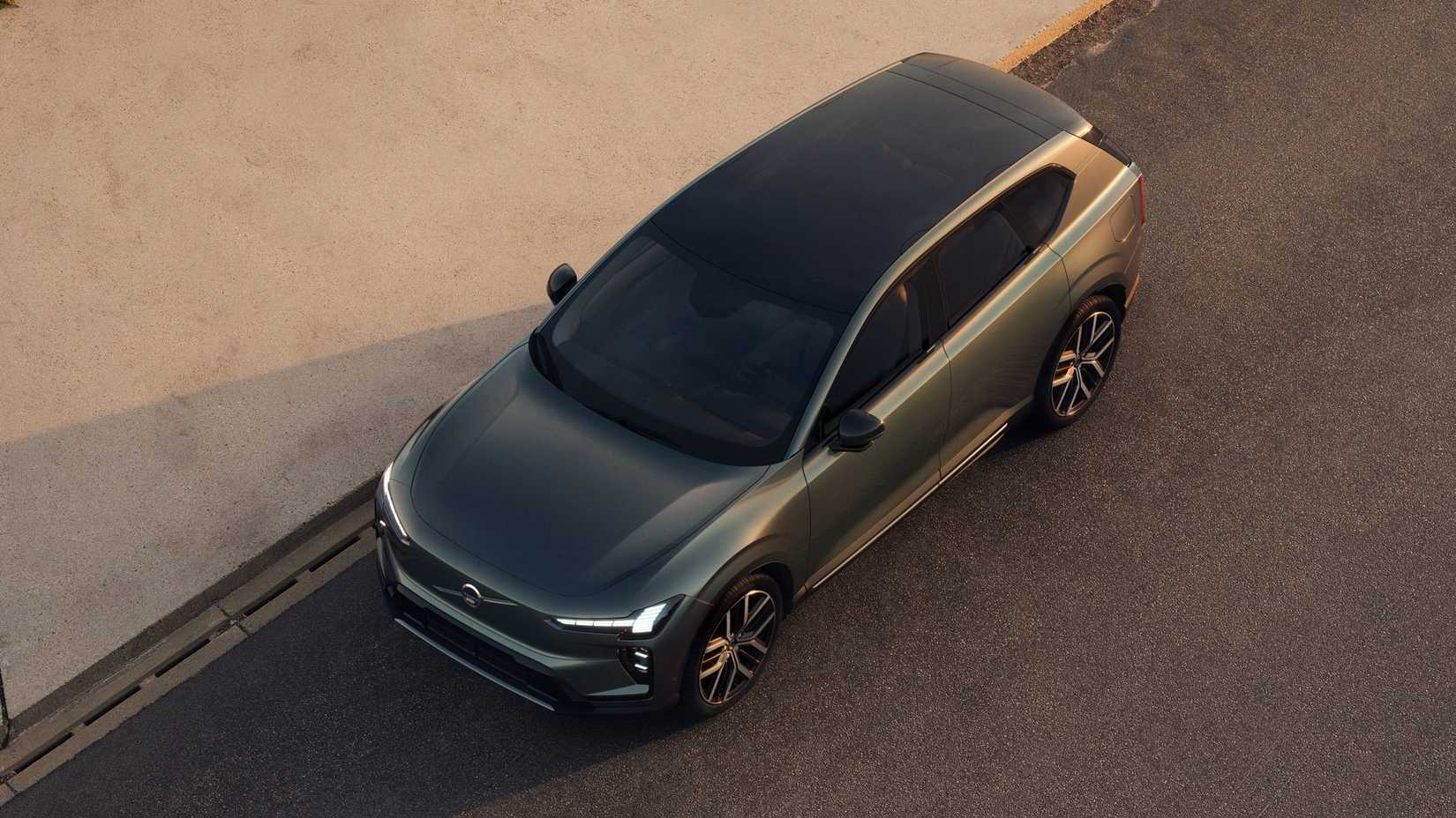 2027 Volvo EX60 from the front three-quarter angle
