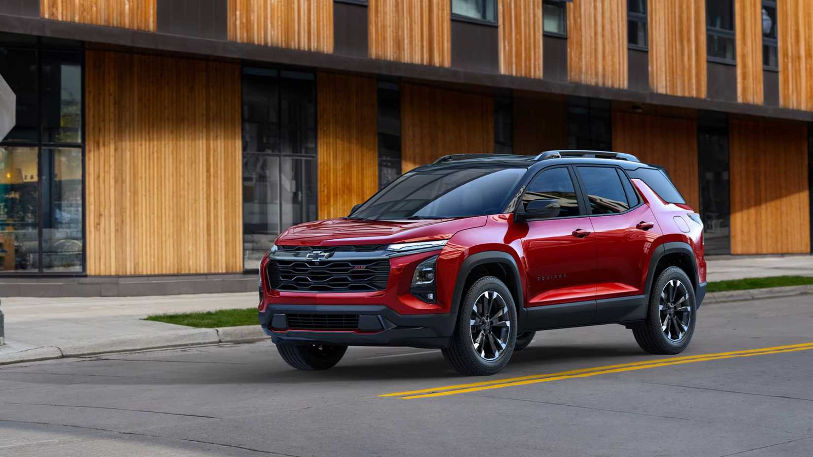 Foto frontal 3/4 de um Chevrolet Equinox 2025 - 2026 dirigindo na cidade