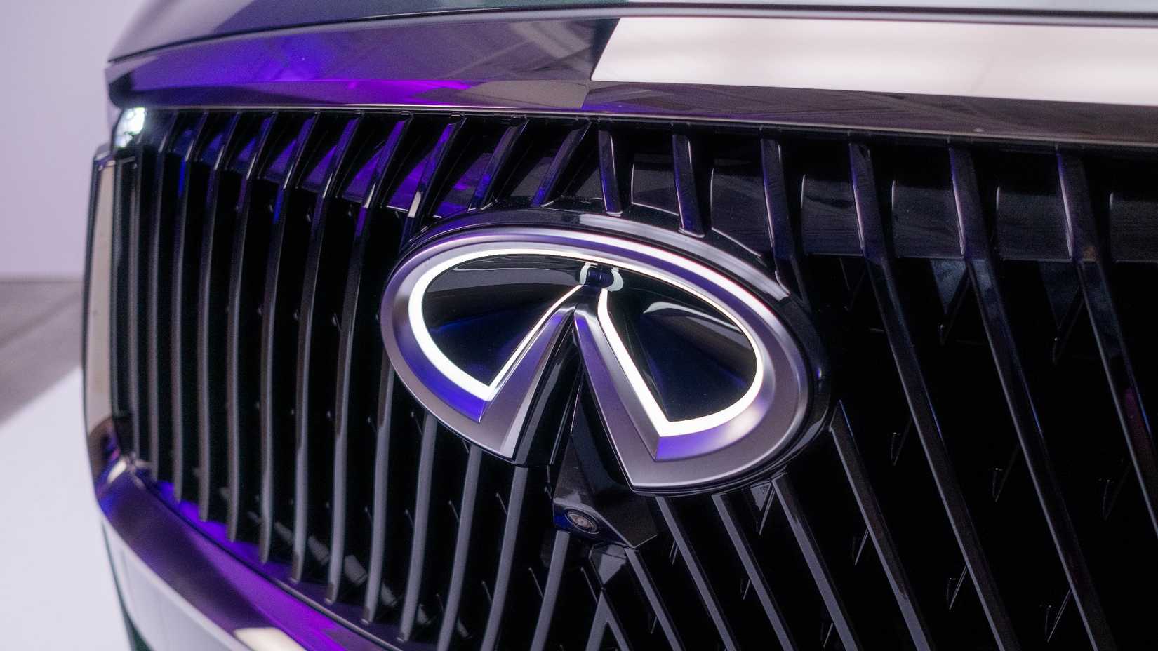 Close-up shot of 2026 Infiniti QX60 Autobiography grille and badge