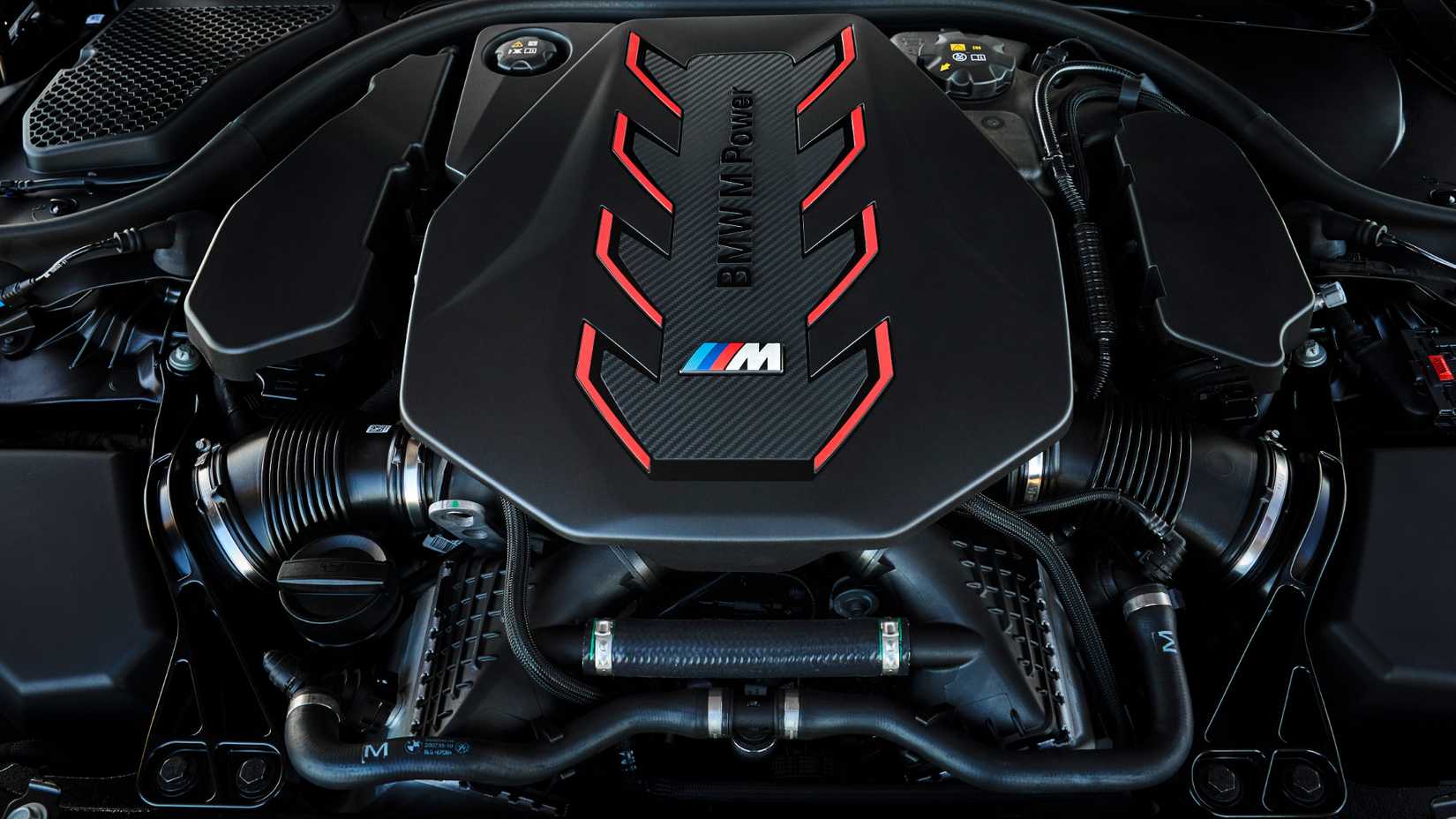 Close-up shot of 2025 BMW M5 Touring 4.4-liter PHEV V8 engine