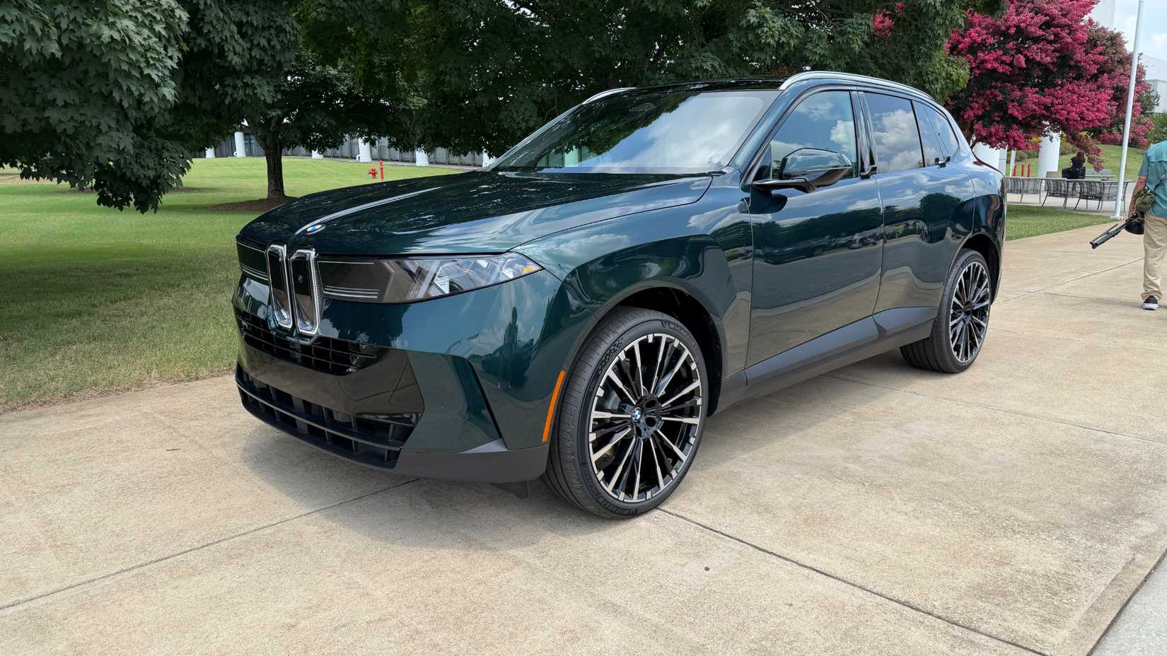 2027 BMW X5 front 3/4 shot parked