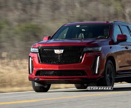 Radiant Red Escalade-V dynamic driving shot