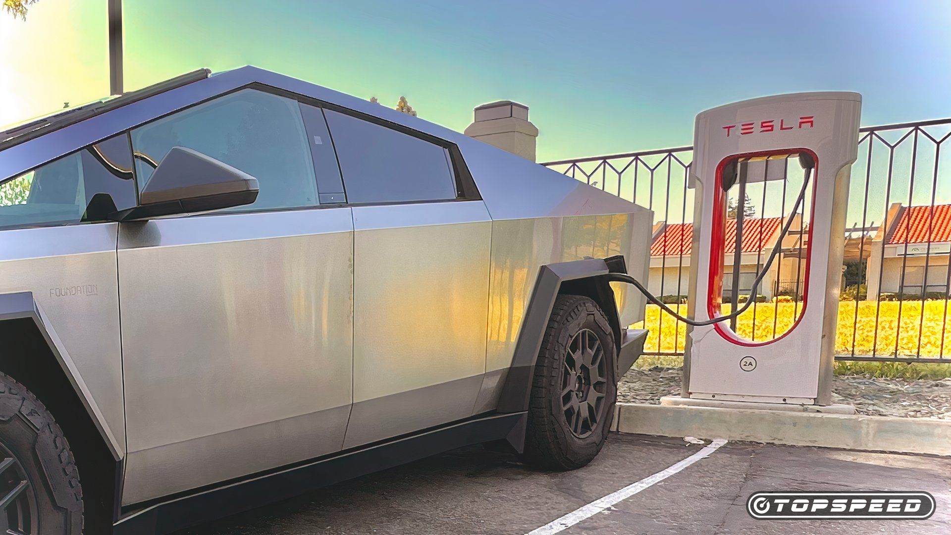 2024 Tesla Cybertruck Tri Motor CyberBeast Charging At A Supercharger Station