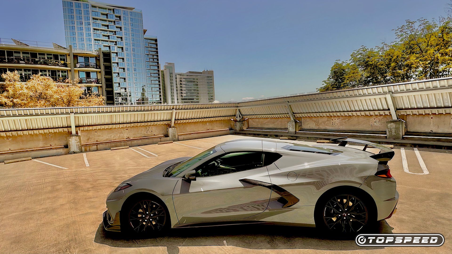 2024 Chevy C8 Corvette Stingray  in Sea Wolf Gray Tri-Coat Parked On A Rooftop (2)