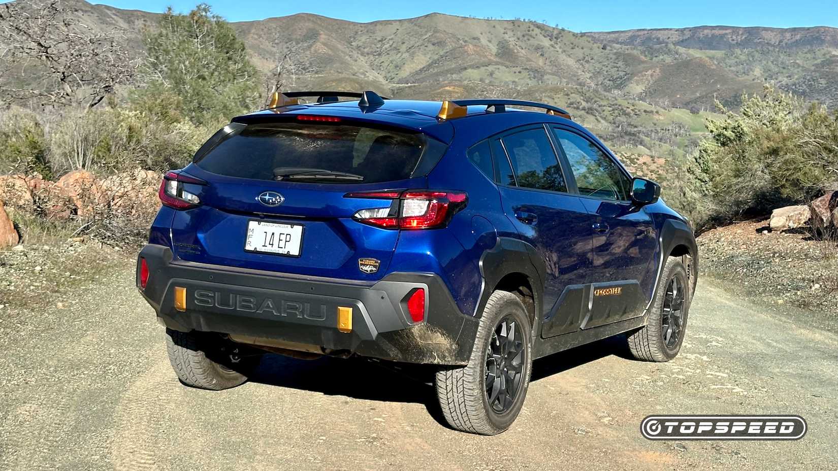 Subaru Crosstrek Wilderness rear 3/4 shot parked off-road