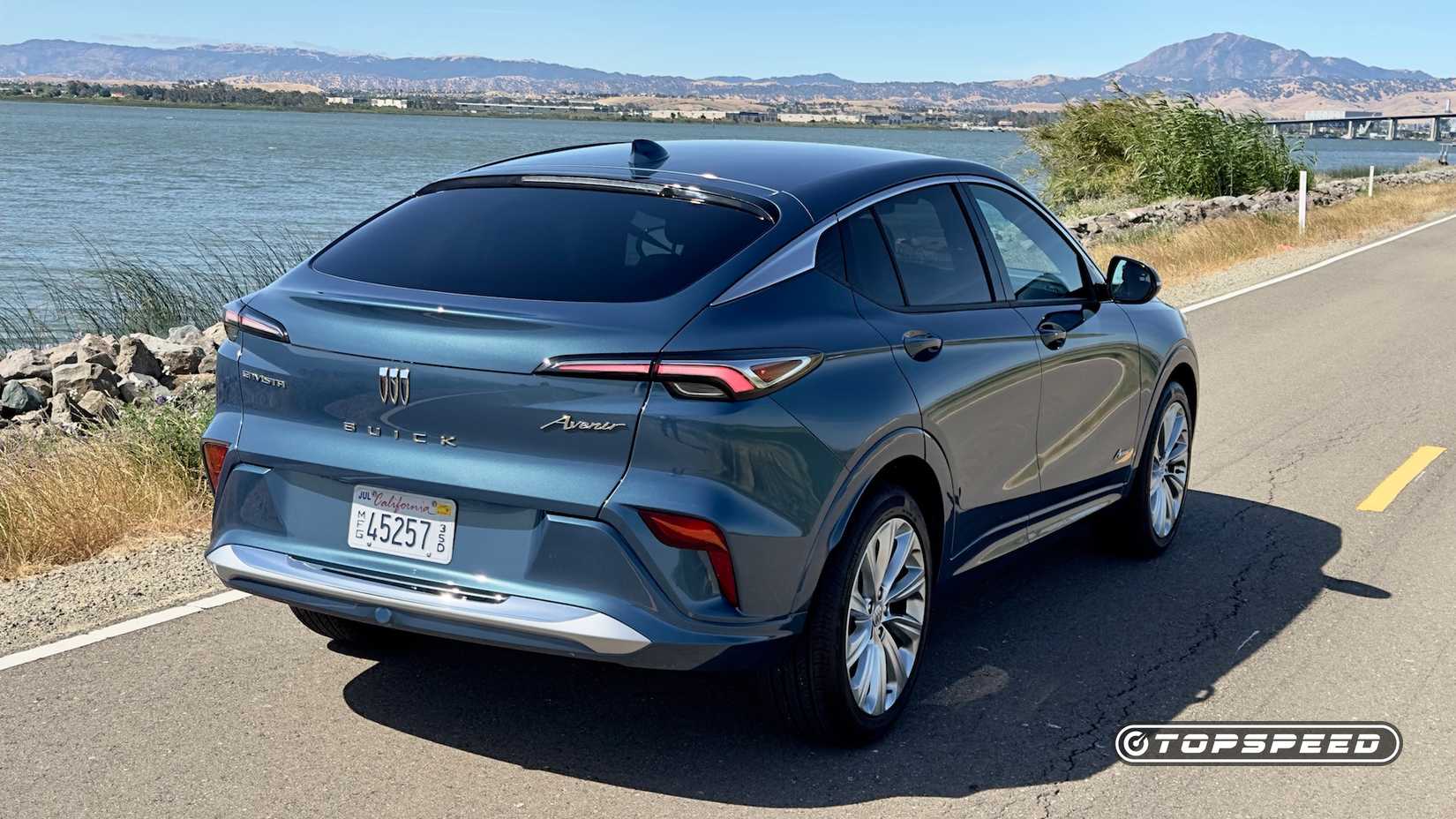 2024 Buick Envista Avenir rear 3/4 shot parked on the road