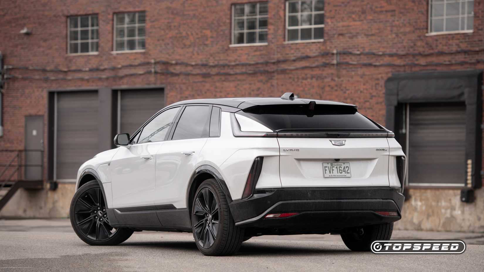 Cadillac LYRIQ in white rear third quarter view