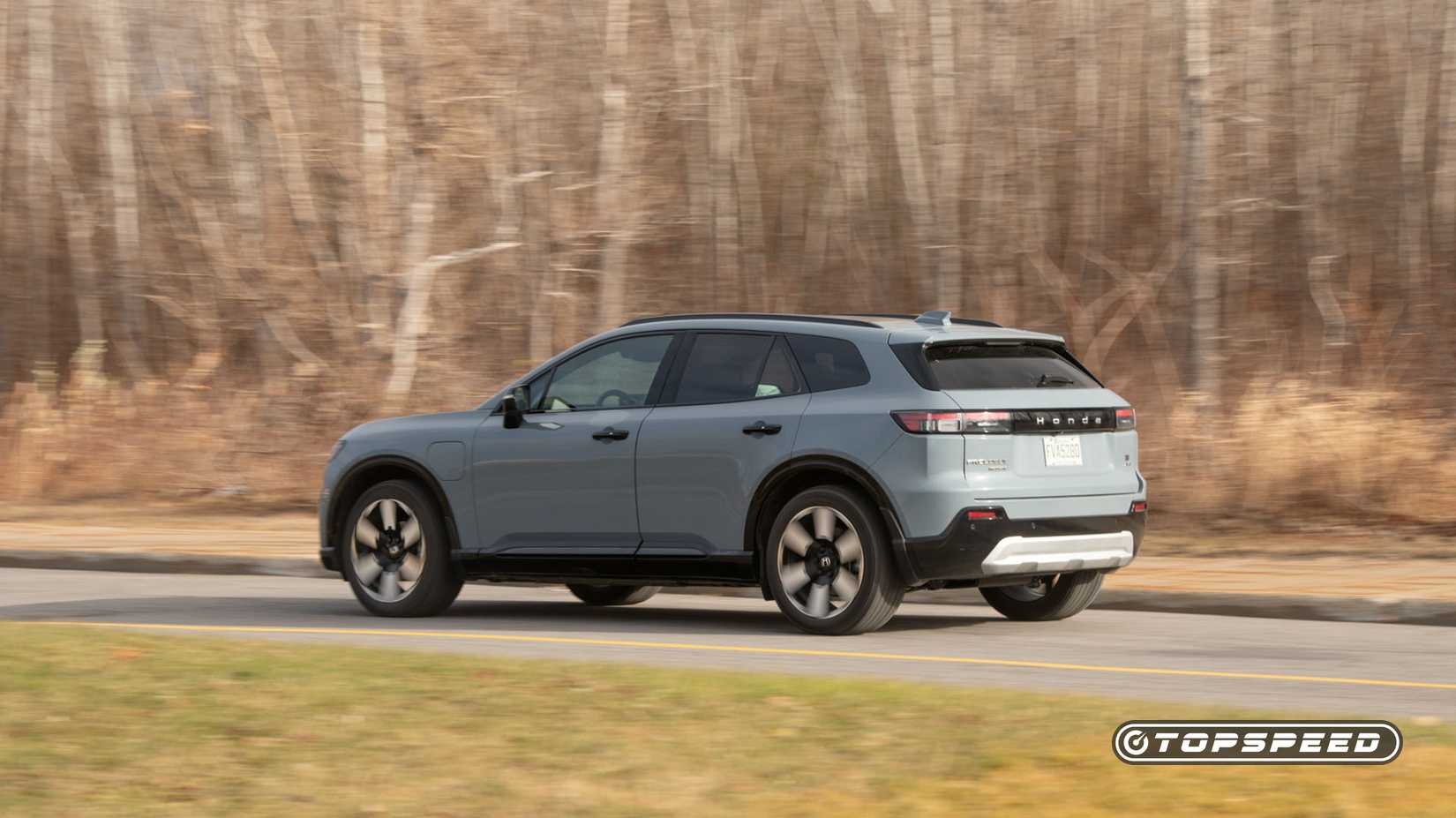 2025 Honda Prologue Driving Rear TopSpeed