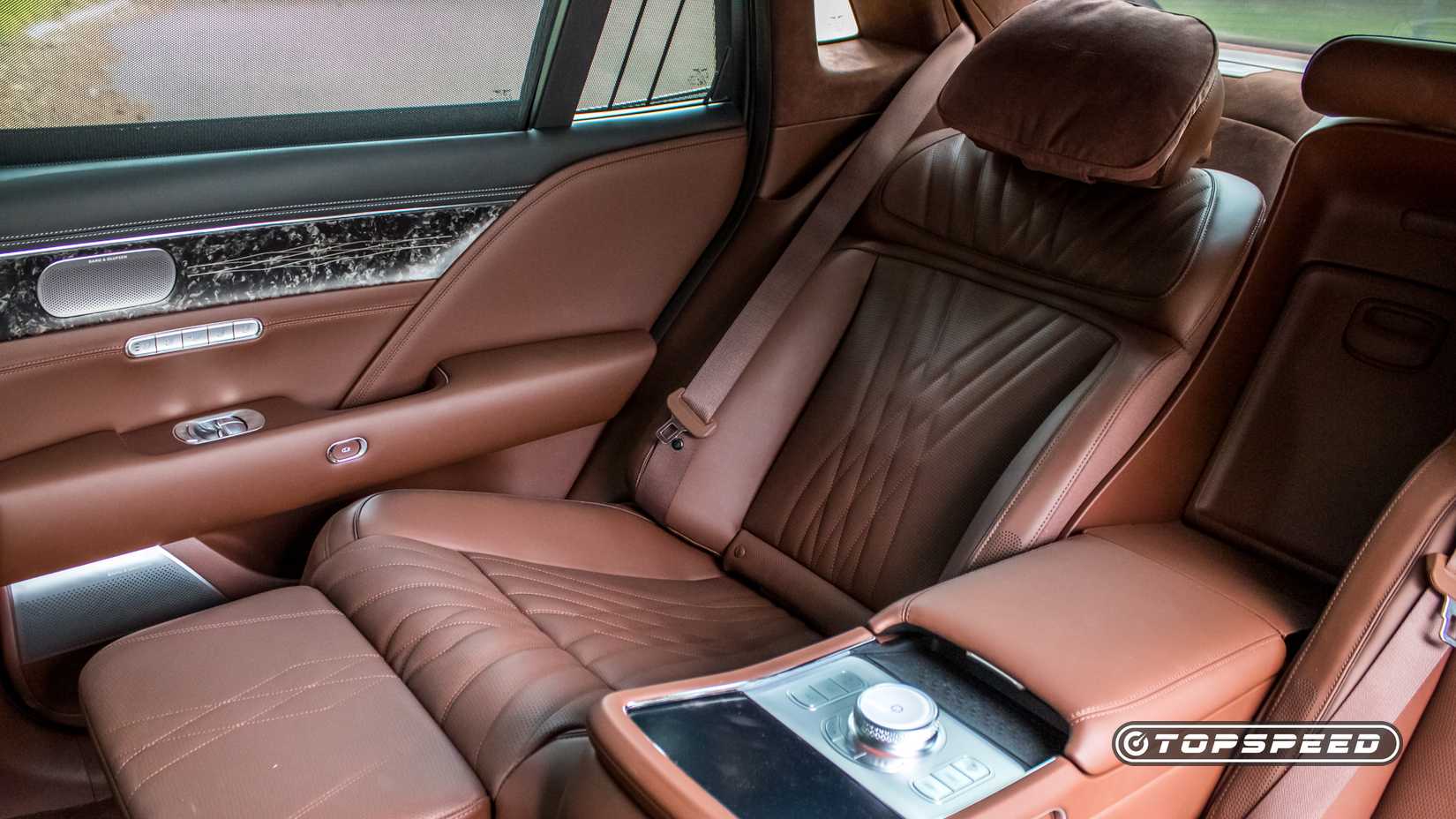 Interior shot of a 2025 Genesis G90 showing the rear seats