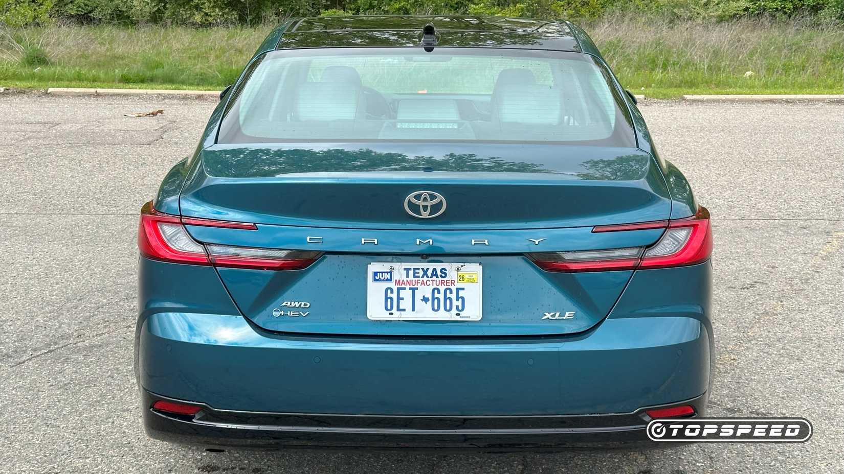 2025 Toyota Camry XLE AWD Rear shot parked in a lot