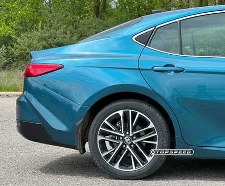 Rear-end shot of a blue 2025 Toyota Camry XLE AWD