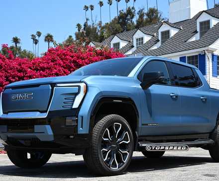 2025 azul GMC Sierra EV Denali frente 3/4