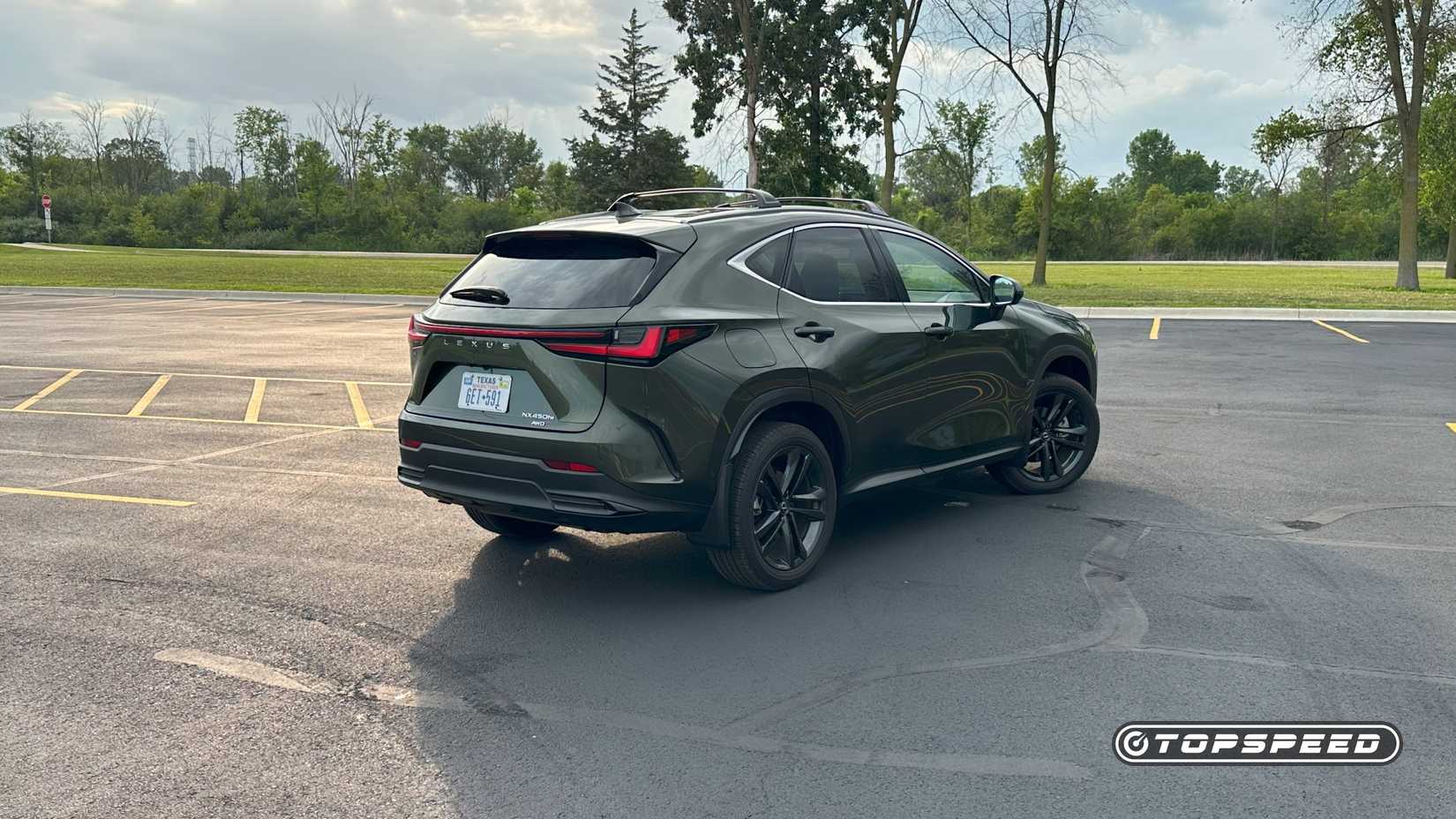 2025 Lexus NX 450h+ Luxury -- Rear Three-Quarter 03