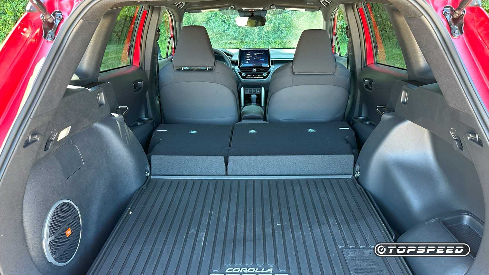 2025 Toyota Corolla Cross Hybrid Nightshade rear shot showing max cargo space