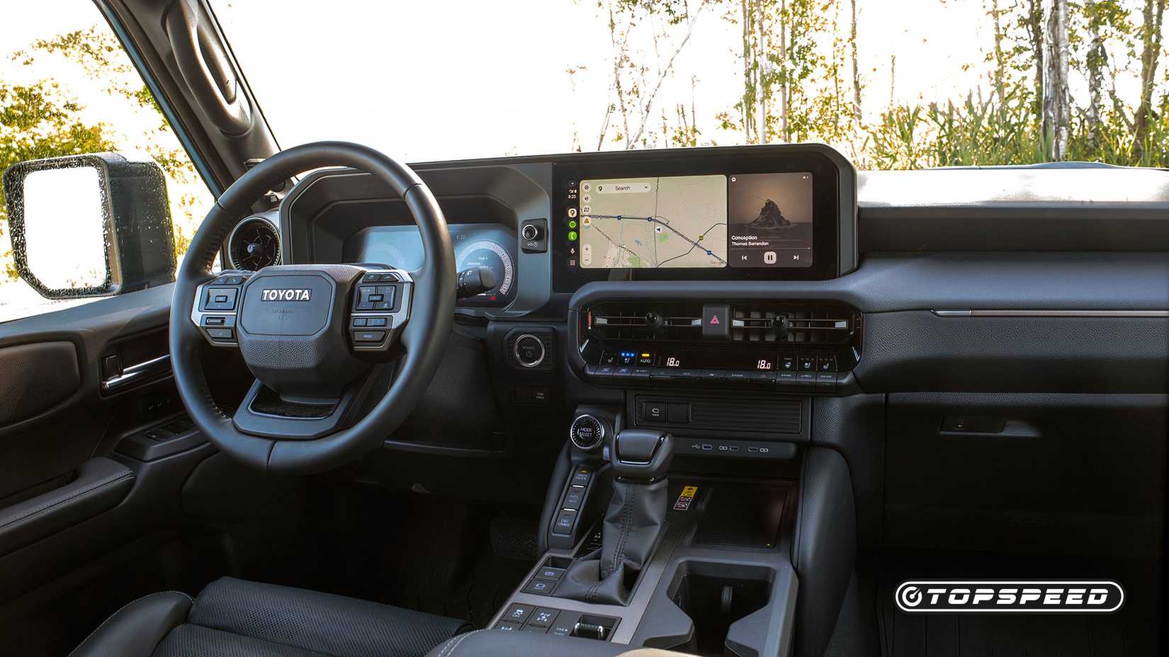 2025 Toyota Land Cruiser Interior shot of the front cabin and dash