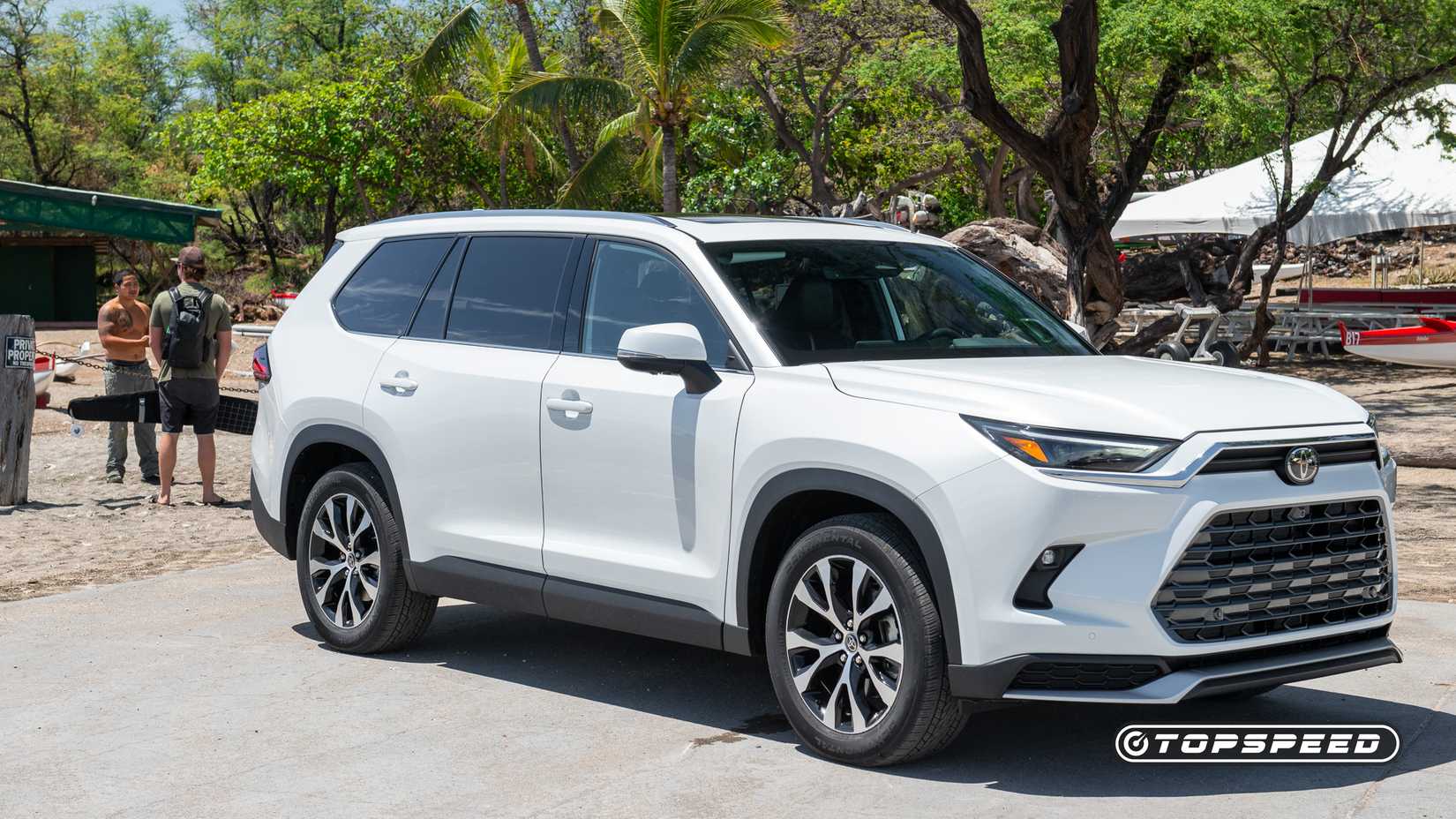 white Toyota Grand Highlander