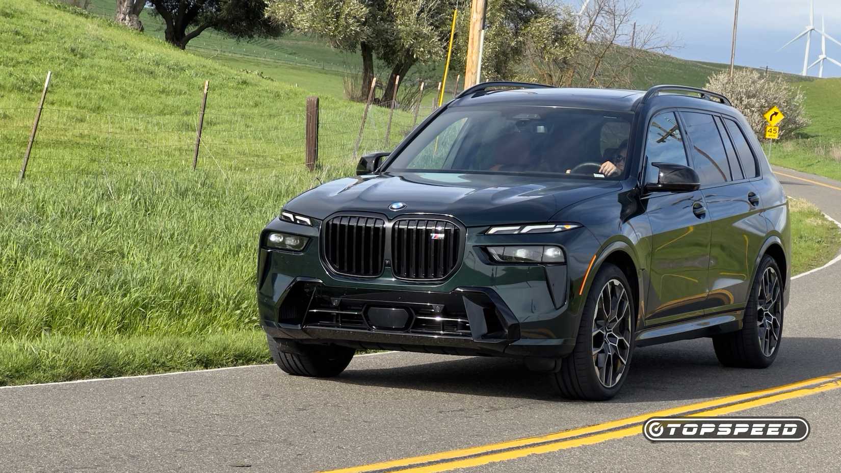 2025 BMW X7 M60i front 3/4 shot parked on the road