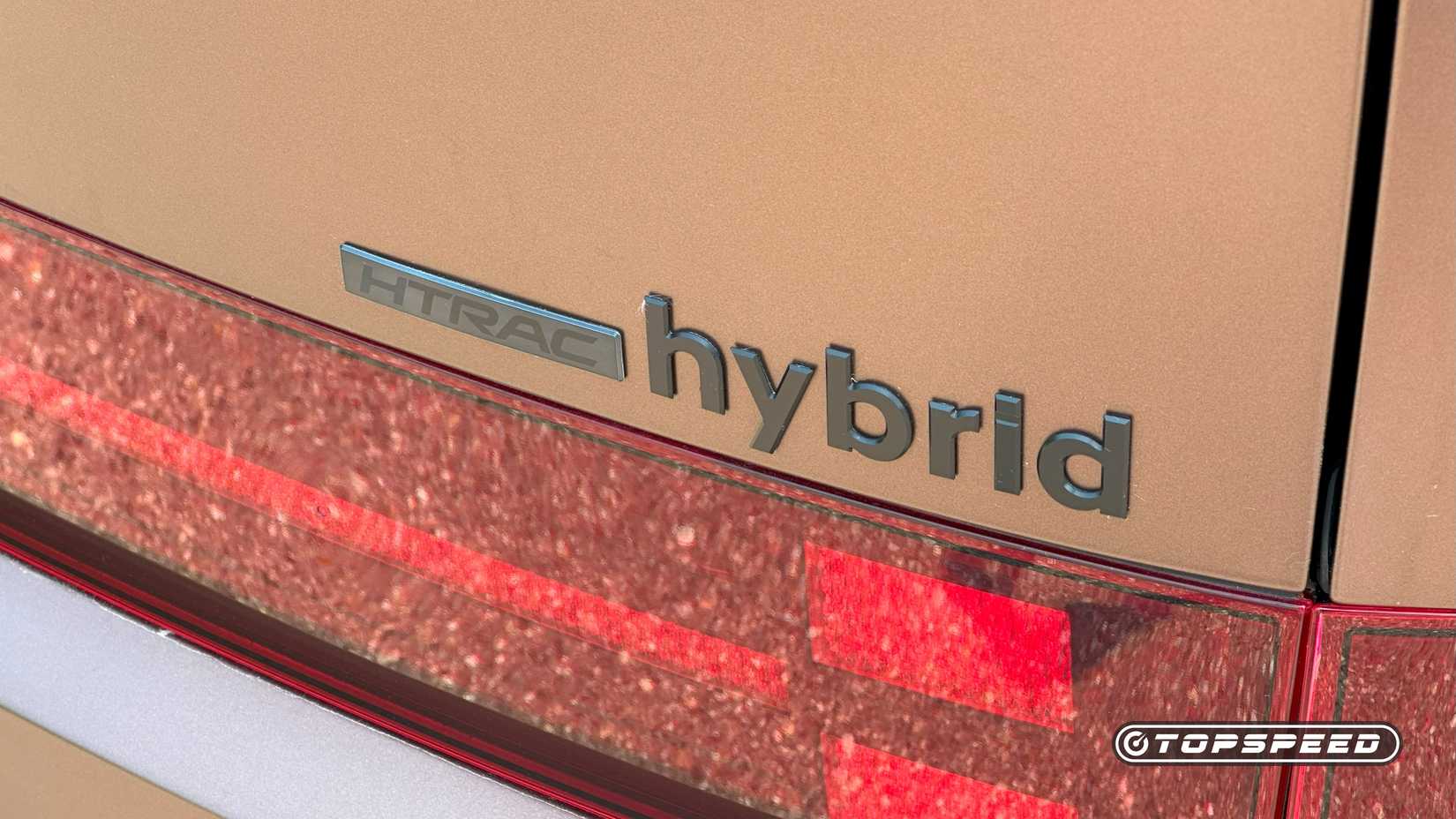2025 Hyundai Santa Fe Hybrid close-up shot of the badge